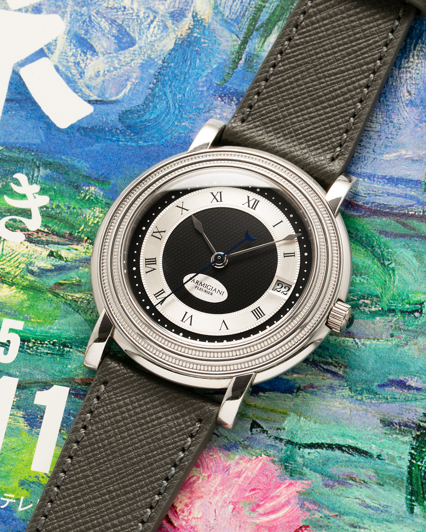Brand: Parmigiani Fleurier
Year: 2000’s
Model: Toric Automatic
Material: Platinum 950
Movement: PF Cal. 13301, Self-Winding
Case Dimensions: 40mm Diameter 8.5mm Thickness
Lug Width: 20mm
Strap: Grey Molequin Textured Calf Strap with Signed Platinum Parmigiani Fleurier Tang Buckle. Additional Used Black Parmigiani Fleurier Alligator Strap