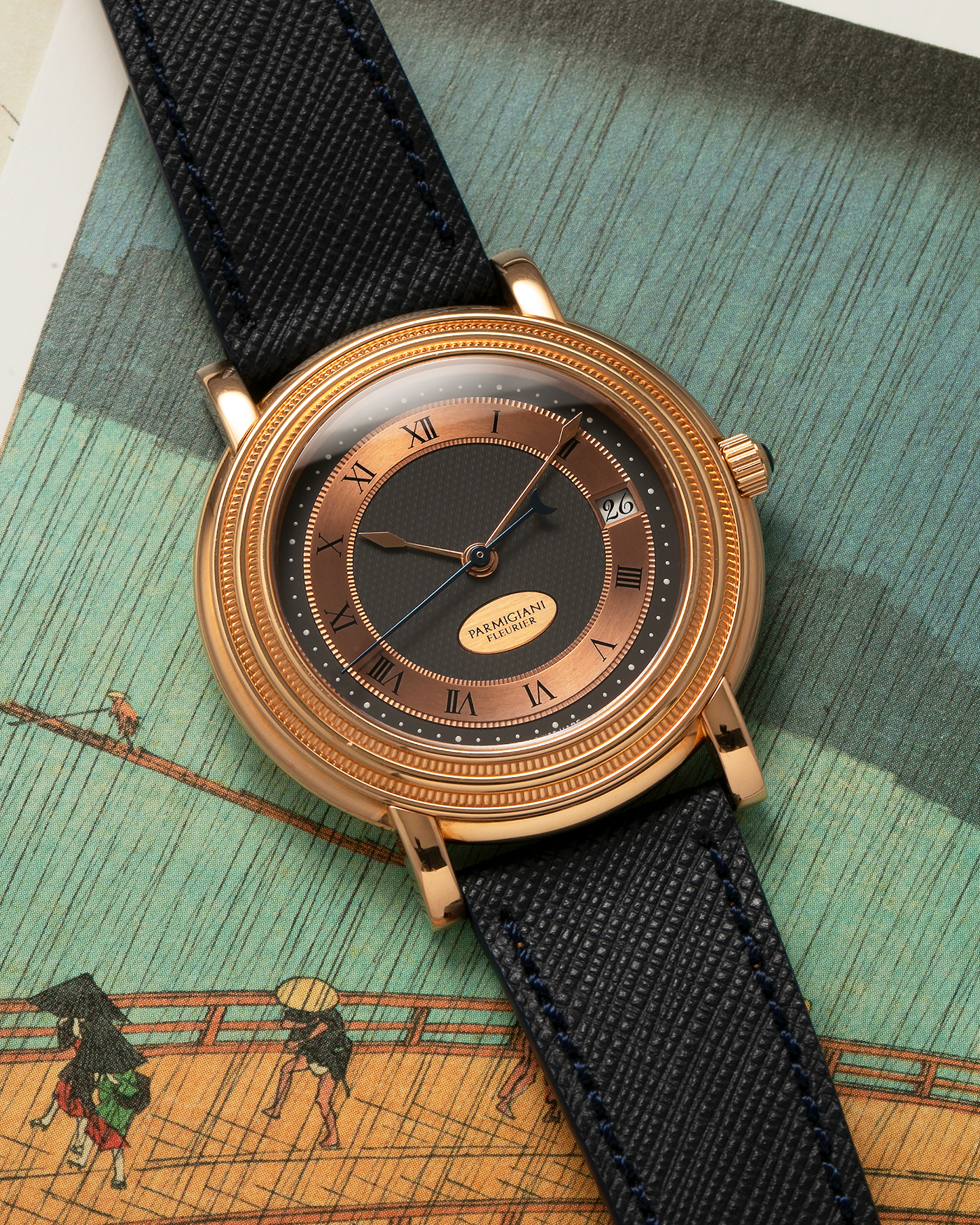 Brand: Parmigiani Fleurier Year: 1990’s Model: Toric Automatic Material: 18-carat Rose Gold Movement: PF Cal. 13301, Self-Winding Case Diameter: 40mm Lug Width: 20mm Strap: Molequin Navy Textured Calf Leather Strap with Signed 18-carat Rose Gold Tang Buckle