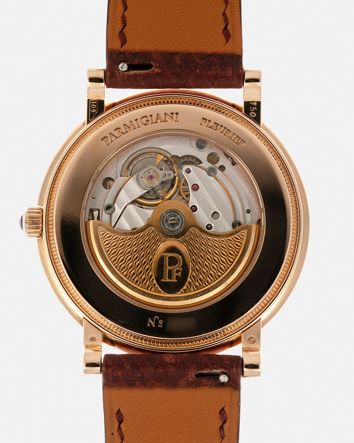 Brand: Parmigiani Fleurier
Year: 1990s
Model: Toric Automatic
Material: 18-carat Rose Gold
Movement: PF Cal. 13301, Self-Winding
Case Dimensions: 40mm x 8mm (Lug-to-Lug 44mm)
Lug Width: 20mm
Strap: Delugs Wine Red Alligator Leather Strap with Signed 18-carat Rose Gold Tang Buckle