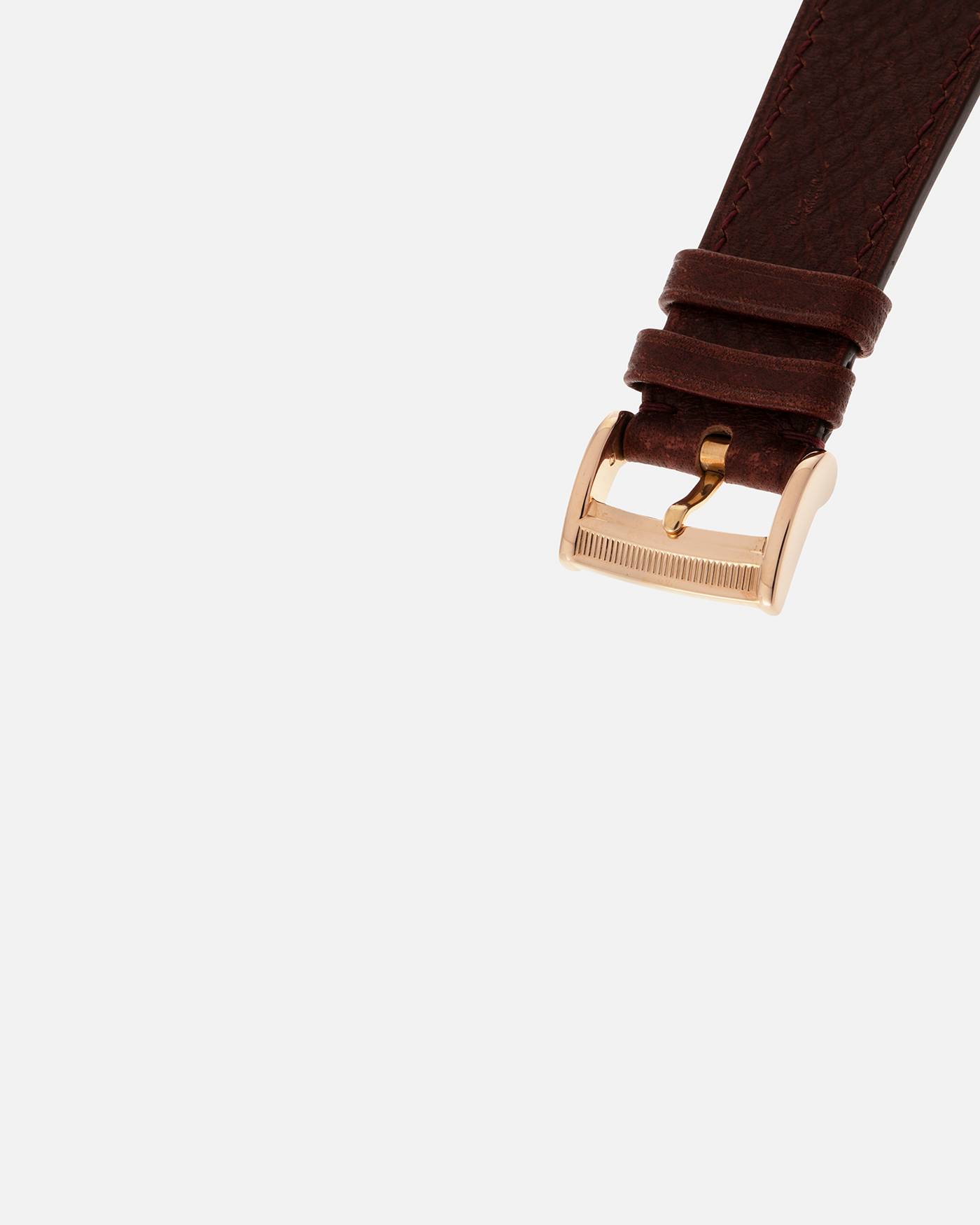 Brand: Parmigiani Fleurier
Year: 1990s
Model: Toric Automatic
Material: 18-carat Rose Gold
Movement: PF Cal. 13301, Self-Winding
Case Dimensions: 40mm x 8mm (Lug-to-Lug 44mm)
Lug Width: 20mm
Strap: Delugs Wine Red Alligator Leather Strap with Signed 18-carat Rose Gold Tang Buckle