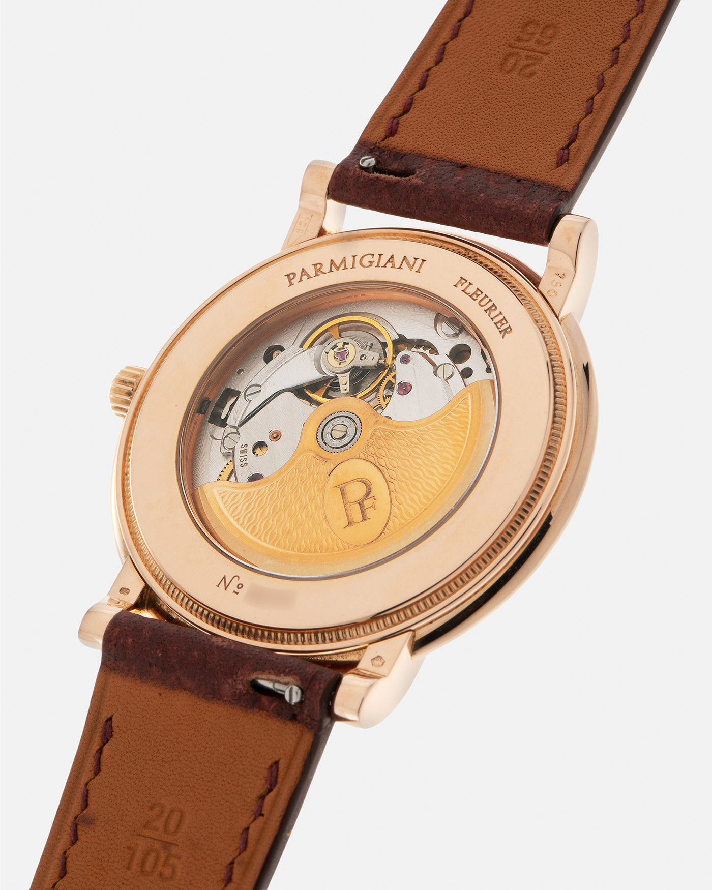 Brand: Parmigiani Fleurier
Year: 1990s
Model: Toric Automatic
Material: 18-carat Rose Gold
Movement: PF Cal. 13301, Self-Winding
Case Dimensions: 40mm x 8mm (Lug-to-Lug 44mm)
Lug Width: 20mm
Strap: Delugs Wine Red Alligator Leather Strap with Signed 18-carat Rose Gold Tang Buckle