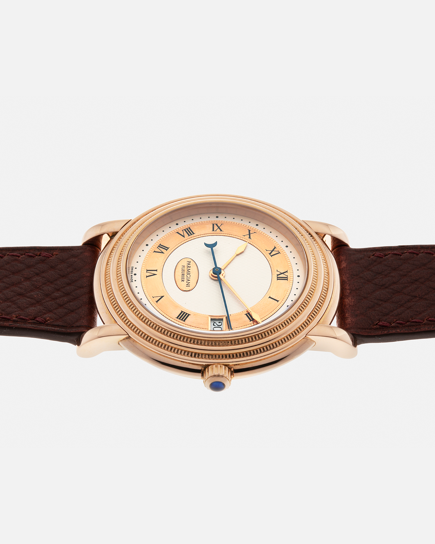 Brand: Parmigiani Fleurier
Year: 1990s
Model: Toric Automatic
Material: 18-carat Rose Gold
Movement: PF Cal. 13301, Self-Winding
Case Dimensions: 40mm x 8mm (Lug-to-Lug 44mm)
Lug Width: 20mm
Strap: Delugs Wine Red Alligator Leather Strap with Signed 18-carat Rose Gold Tang Buckle
