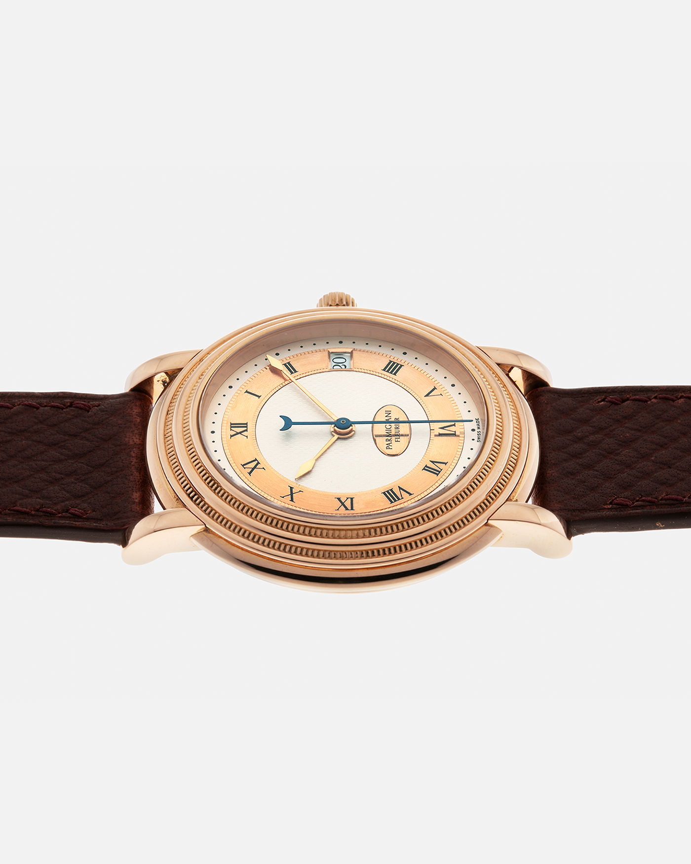 Brand: Parmigiani Fleurier
Year: 1990s
Model: Toric Automatic
Material: 18-carat Rose Gold
Movement: PF Cal. 13301, Self-Winding
Case Dimensions: 40mm x 8mm (Lug-to-Lug 44mm)
Lug Width: 20mm
Strap: Delugs Wine Red Alligator Leather Strap with Signed 18-carat Rose Gold Tang Buckle