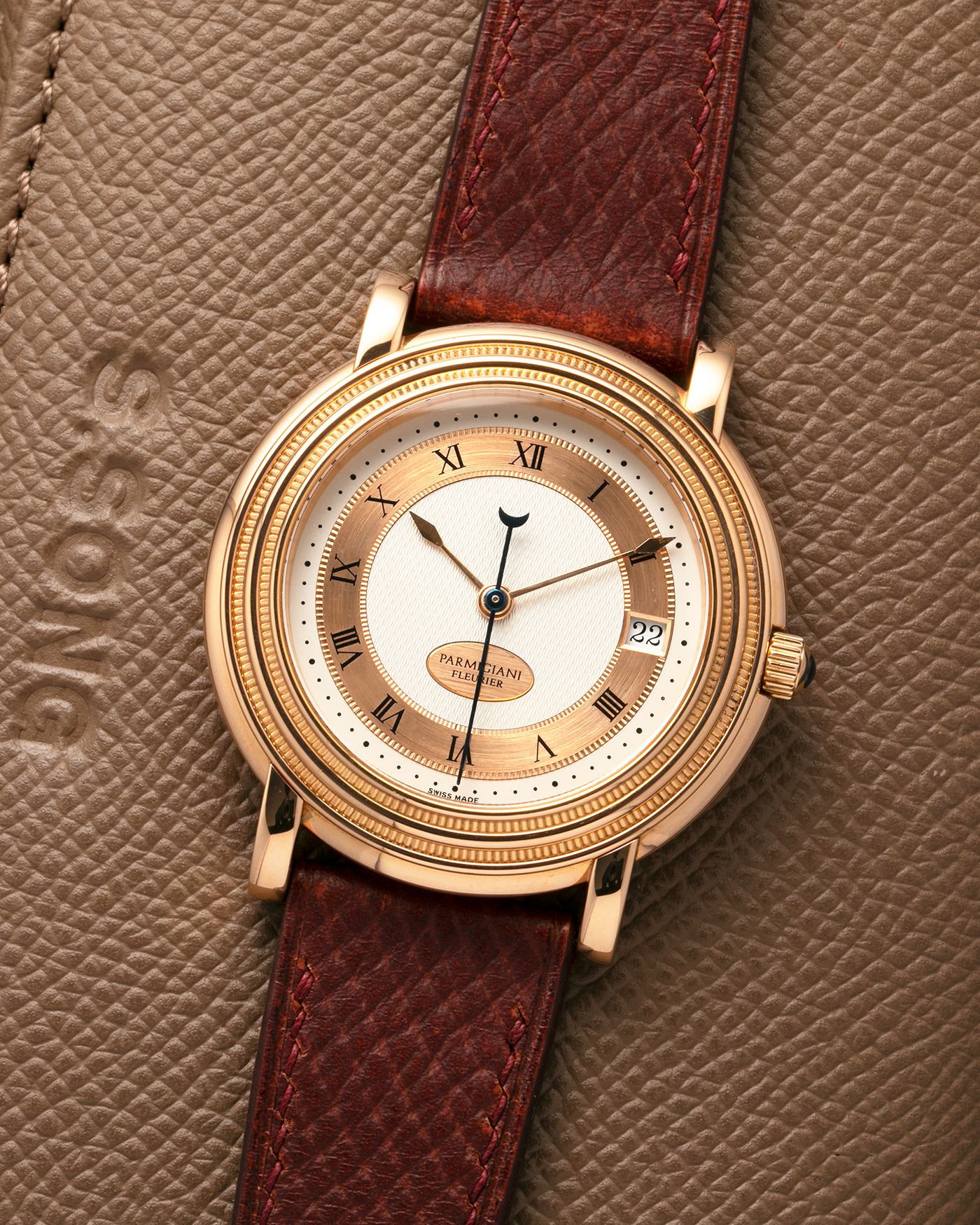Brand: Parmigiani Fleurier
Year: 1990s
Model: Toric Automatic
Material: 18-carat Rose Gold
Movement: PF Cal. 13301, Self-Winding
Case Dimensions: 40mm x 8mm (Lug-to-Lug 44mm)
Lug Width: 20mm
Strap: Delugs Wine Red Alligator Leather Strap with Signed 18-carat Rose Gold Tang Buckle
