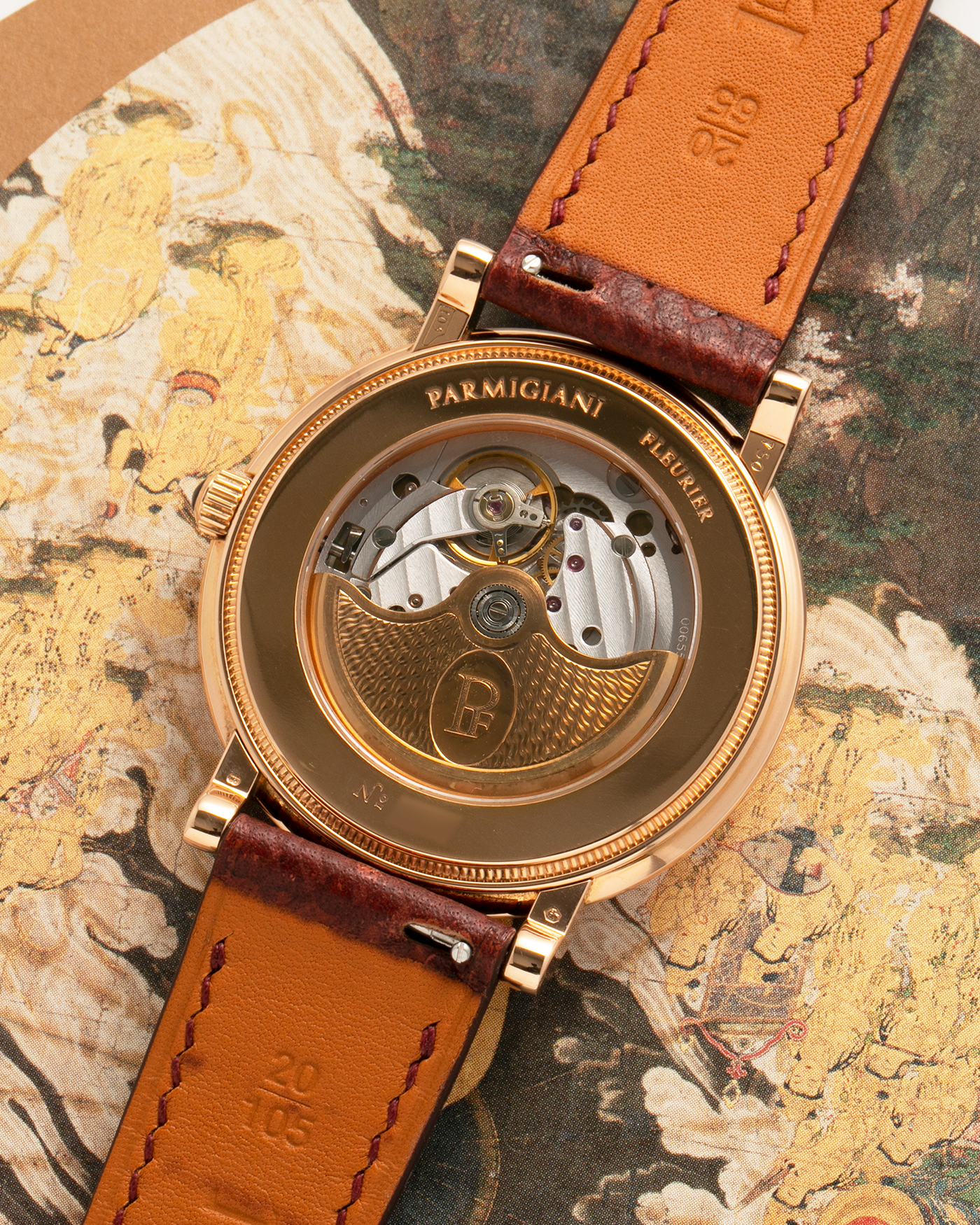 Brand: Parmigiani Fleurier
Year: 1990s
Model: Toric Automatic
Material: 18-carat Rose Gold
Movement: PF Cal. 13301, Self-Winding
Case Dimensions: 40mm x 8mm (Lug-to-Lug 44mm)
Lug Width: 20mm
Strap: Delugs Wine Red Alligator Leather Strap with Signed 18-carat Rose Gold Tang Buckle