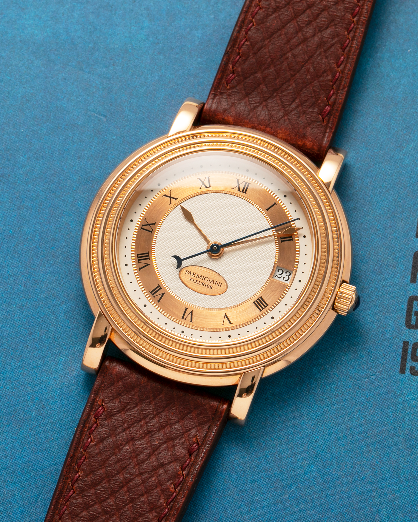 Brand: Parmigiani Fleurier
Year: 1990s
Model: Toric Automatic
Material: 18-carat Rose Gold
Movement: PF Cal. 13301, Self-Winding
Case Dimensions: 40mm x 8mm (Lug-to-Lug 44mm)
Lug Width: 20mm
Strap: Delugs Wine Red Alligator Leather Strap with Signed 18-carat Rose Gold Tang Buckle