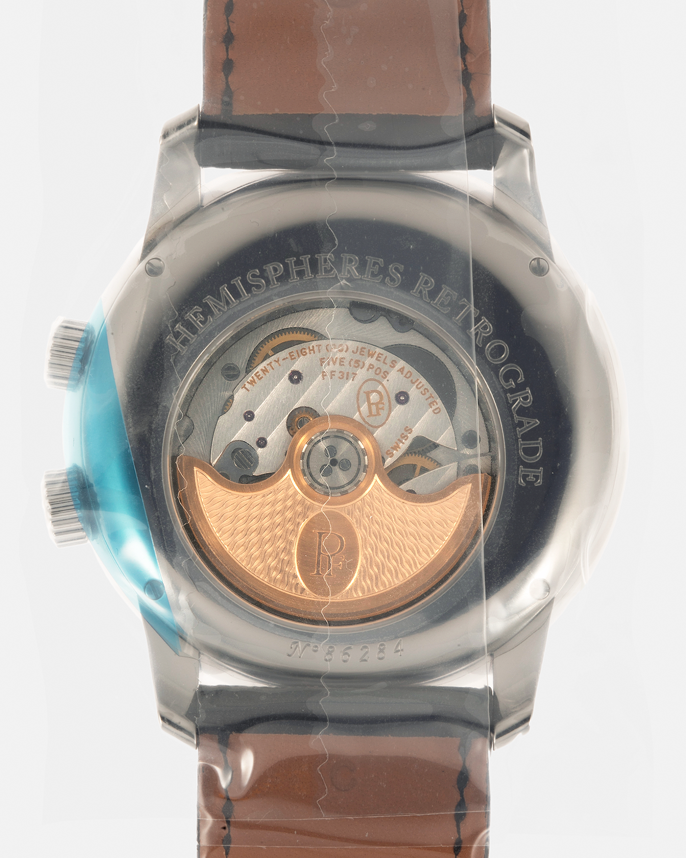 Brand: Parmigiani Fleurier
Year: 2023
Model: Toric Hemisphères Rétrograde
Reference: PFC493-0001400-XA1442
Material: Stainless Steel Case, 18-carat Pink Gold Accents
Movement: Parmigiani Fleurier Cal. 317, Self-Winding
Case Dimensions: 42.8mm x 14.16mm (Lug-to-Lug 47.5mm)
Lug Width: 22mm
Strap: Hermès for Parmigiani Fleurier Black Alligator Leather Strap with Stainless Steel Signed Deployant Clasp