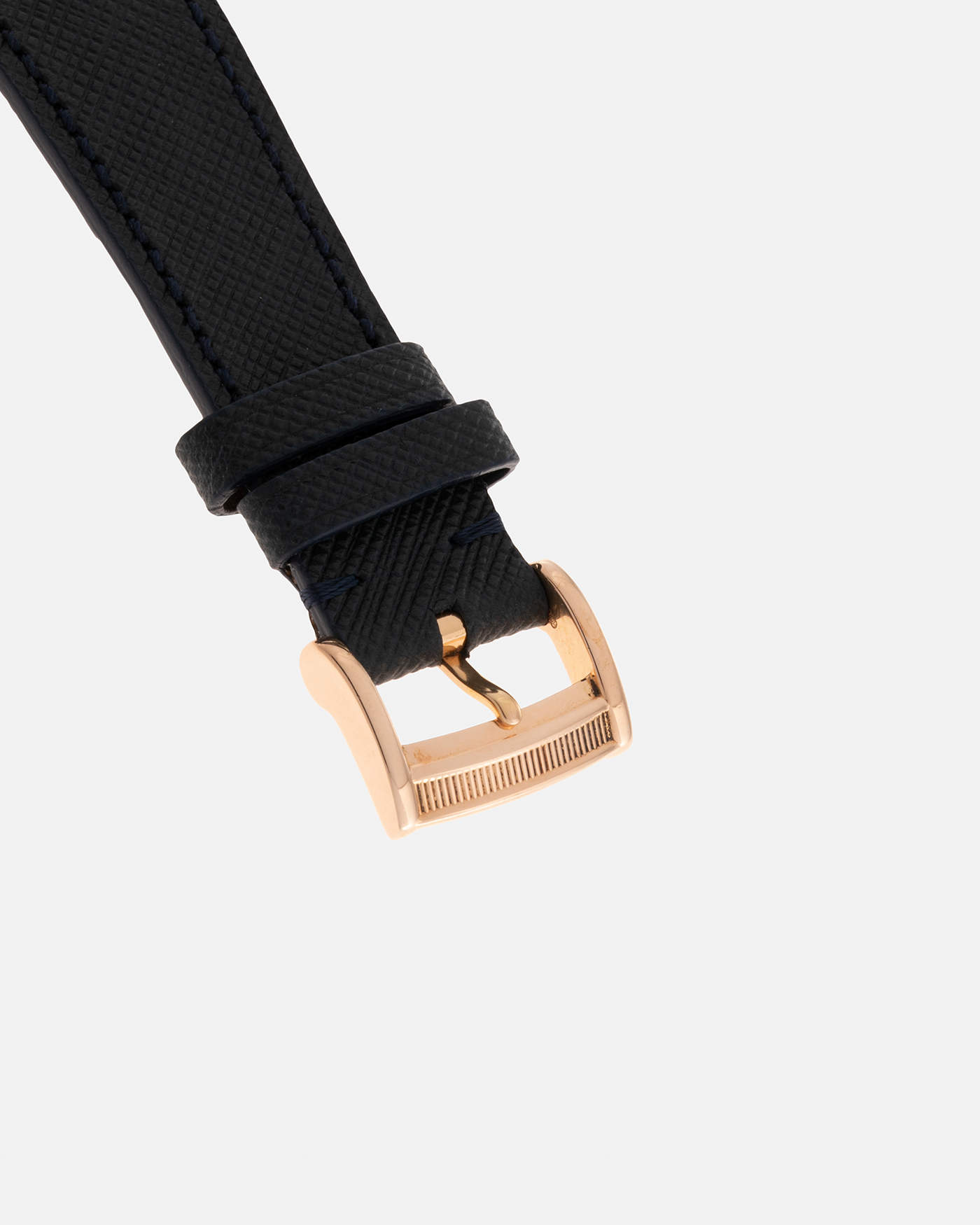 Brand: Parmigiani Fleurier Year: 1990’s Model: Toric Automatic Material: 18-carat Rose Gold Movement: PF Cal. 13301, Self-Winding Case Diameter: 40mm Lug Width: 20mm Strap: Molequin Navy Textured Calf Leather Strap with Signed 18-carat Rose Gold Tang Buckle