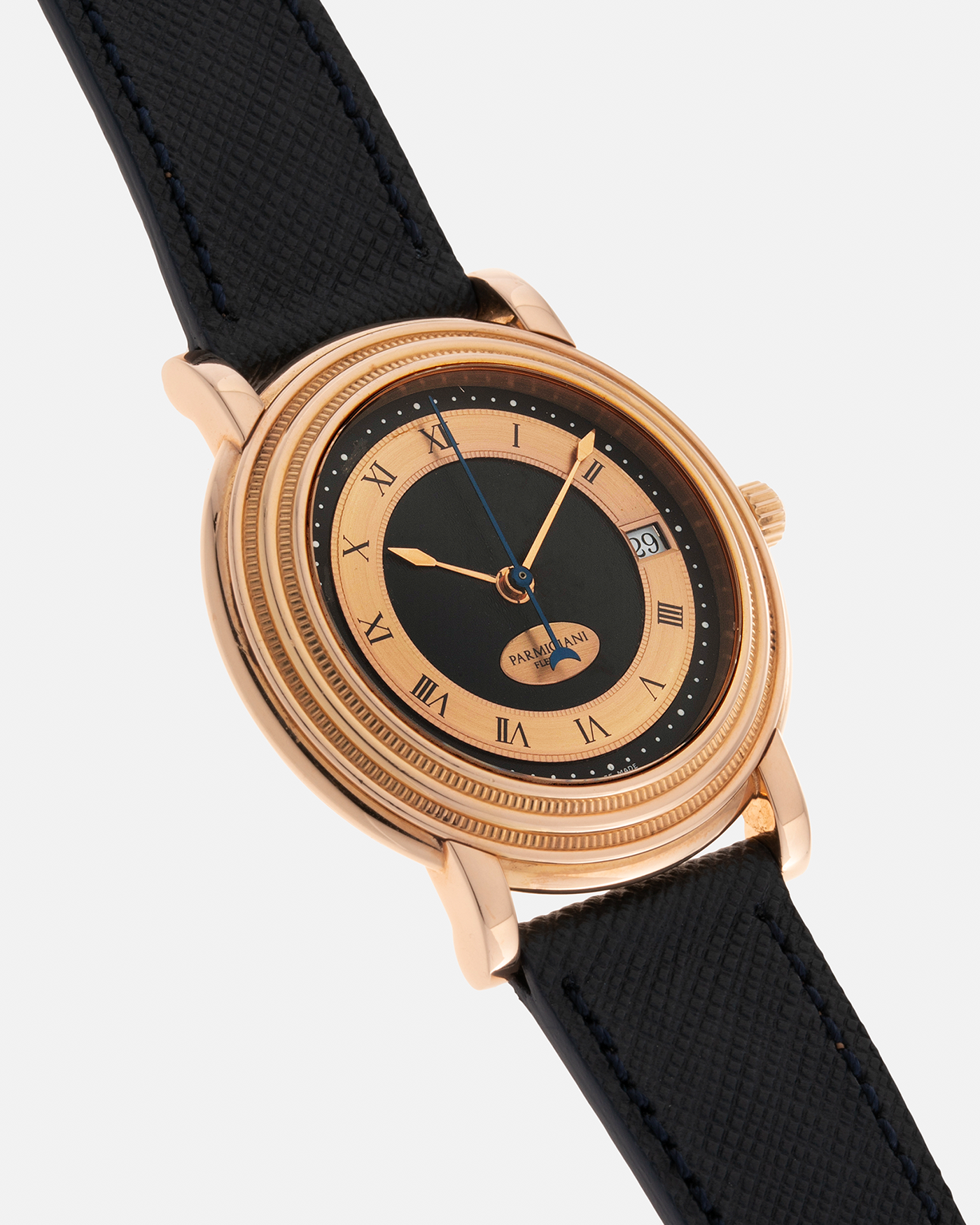 Brand: Parmigiani Fleurier Year: 1990’s Model: Toric Automatic Material: 18-carat Rose Gold Movement: PF Cal. 13301, Self-Winding Case Diameter: 40mm Lug Width: 20mm Strap: Molequin Navy Textured Calf Leather Strap with Signed 18-carat Rose Gold Tang Buckle