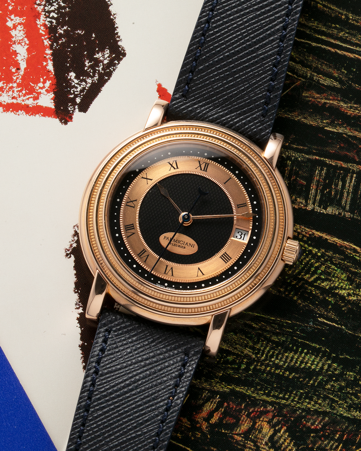 Brand: Parmigiani Fleurier Year: 1990’s Model: Toric Automatic Material: 18-carat Rose Gold Movement: PF Cal. 13301, Self-Winding Case Diameter: 40mm Lug Width: 20mm Strap: Molequin Navy Textured Calf Leather Strap with Signed 18-carat Rose Gold Tang Buckle