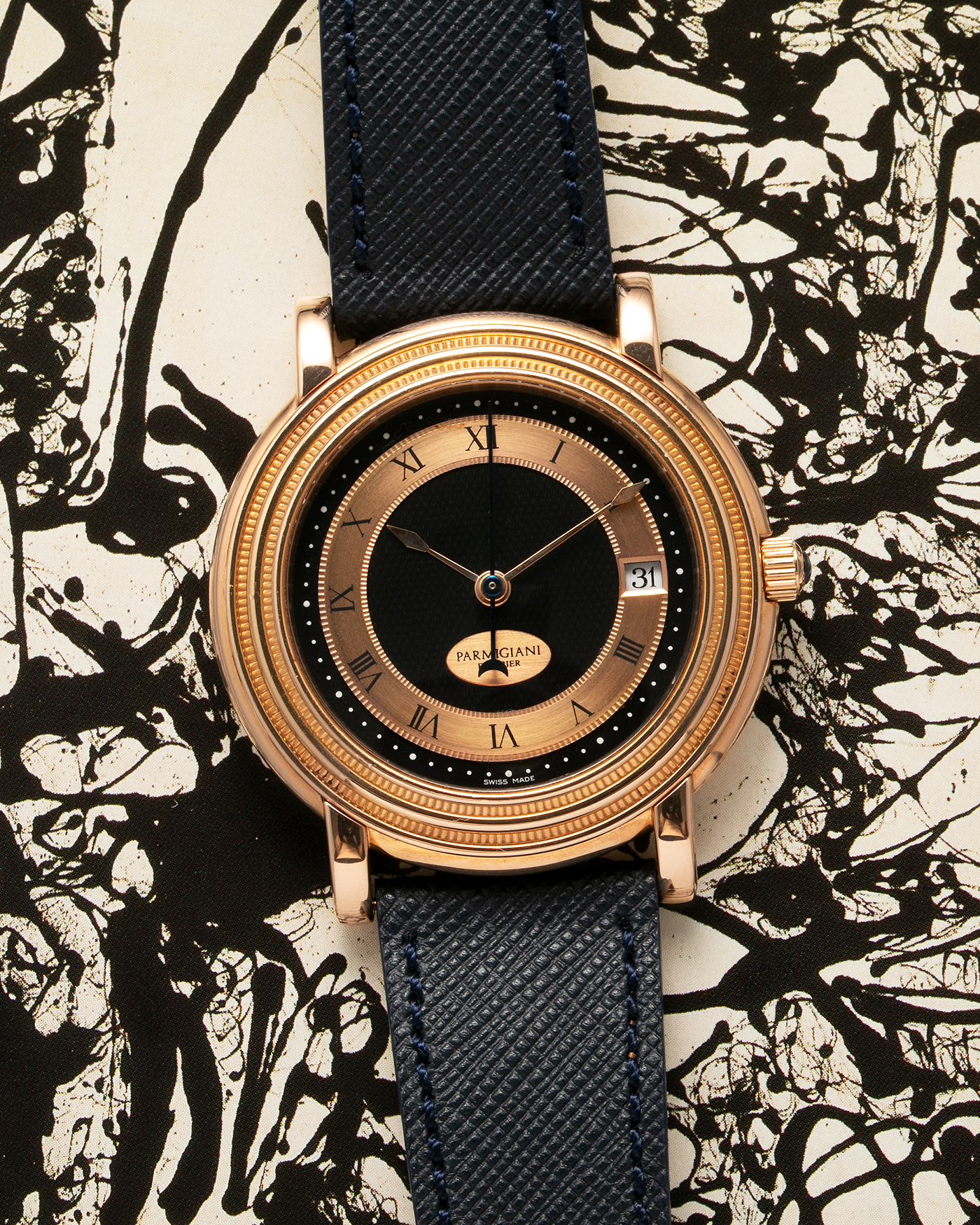 Brand: Parmigiani Fleurier Year: 1990’s Model: Toric Automatic Material: 18-carat Rose Gold Movement: PF Cal. 13301, Self-Winding Case Diameter: 40mm Lug Width: 20mm Strap: Molequin Navy Textured Calf Leather Strap with Signed 18-carat Rose Gold Tang Buckle