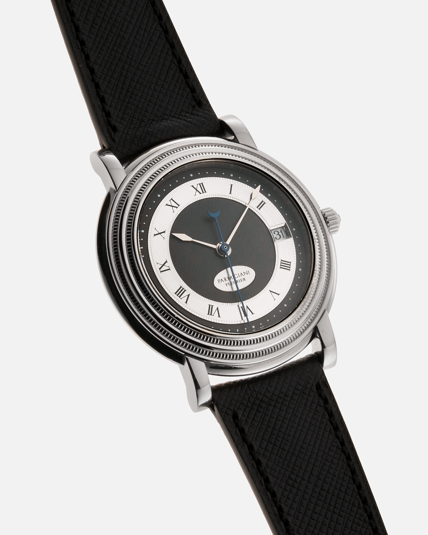Brand: Parmigiani Fleurier Year: 1990’s Model: Toric Automatic Material: 18-carat White Gold Movement: PF Cal. 13301, Self-Winding Case Diameter: 40mm Strap: Molequin Black Textured Calf Leather Strap with 18-carat White Gold Signed Tang Buckle