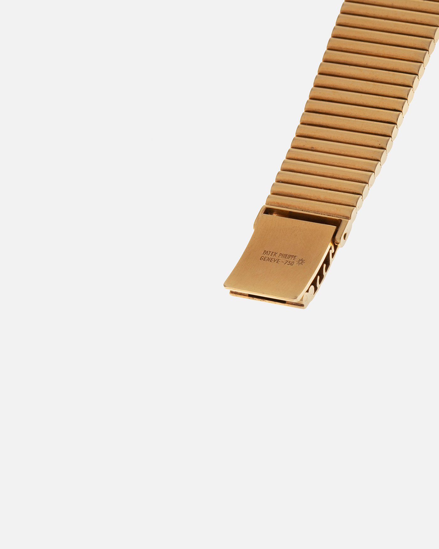Brand: Patek Philippe
Year: 1976
Model: Gondolo
Reference Number: 3733J
Material: 18-carat Yellow Gold Case, Black Onyx Stone Dial
Movement: Patek Philippe Cal. 215, Manual-Winding
Case Dimensions: 29mm x 33mm (Including Lugs) x 6.5mm
Bracelet: Patek Philippe Ribbed Integrated Bracelet in 18-carat Yellow Gold with Signed Clasp