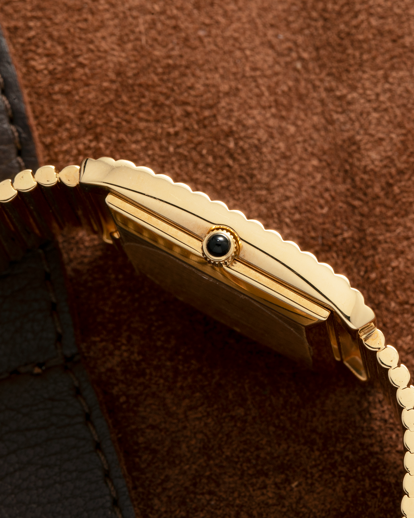 Brand: Patek Philippe
Year: 1976
Model: Gondolo
Reference Number: 3733J
Material: 18-carat Yellow Gold Case, Black Onyx Stone Dial
Movement: Patek Philippe Cal. 215, Manual-Winding
Case Dimensions: 29mm x 33mm (Including Lugs) x 6.5mm
Bracelet: Patek Philippe Ribbed Integrated Bracelet in 18-carat Yellow Gold with Signed Clasp