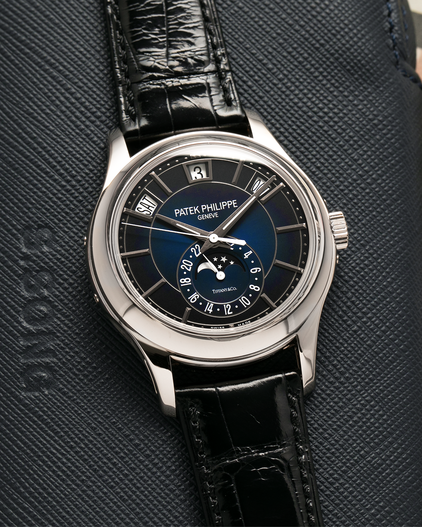 Brand: Patek Philippe
Year: 2019
Model: Annual Calendar
Reference Number: 5205G
Material: 18k White Gold
Movement: Caliber 324 S QA LU 24H
Case Dimensions: 40mm Diameter 11.36mm Thickness
Strap: Patek Philippe Black Alligator Strap and 18k White Gold Patek Philippe Tang Buckle