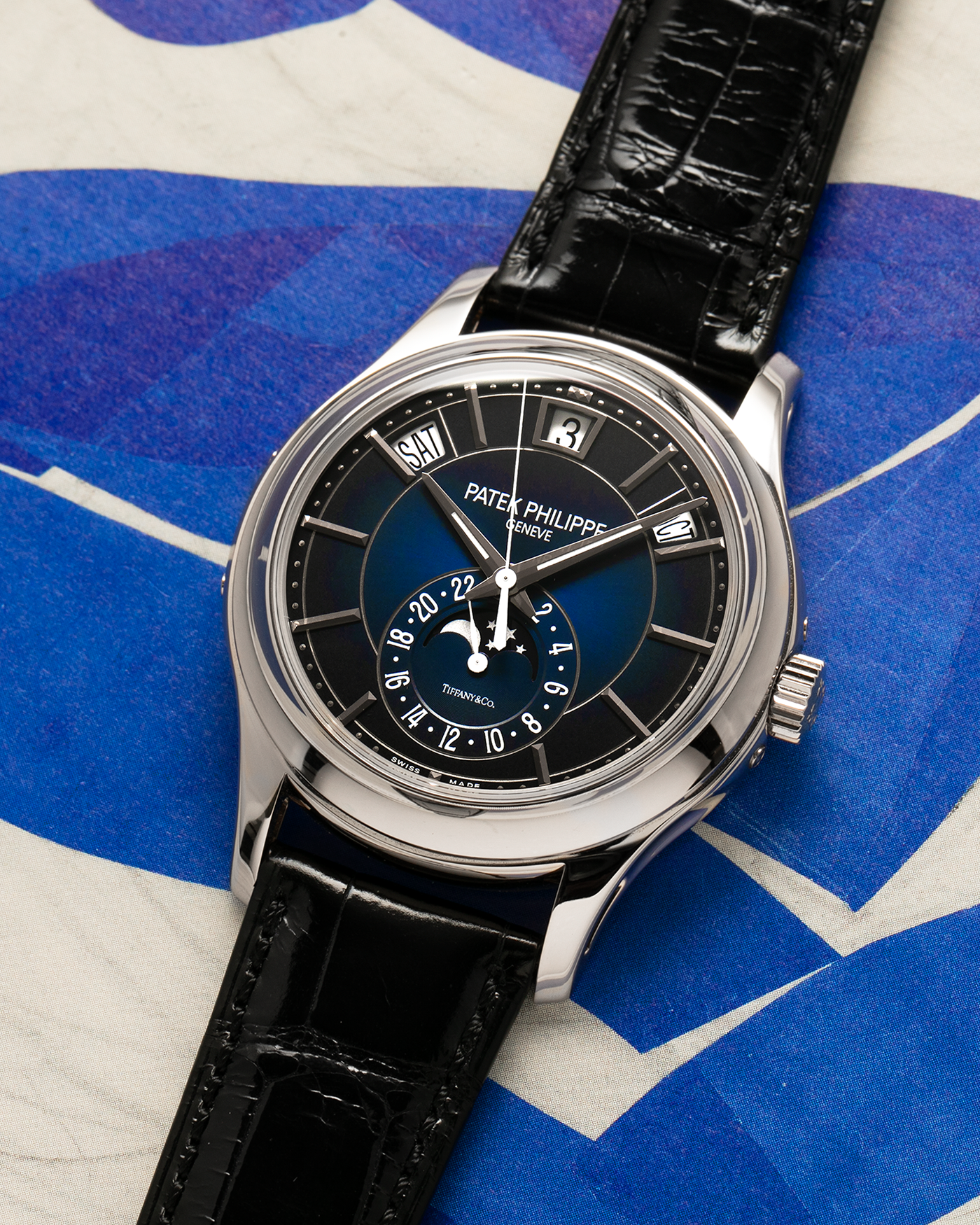 Brand: Patek Philippe
Year: 2019
Model: Annual Calendar
Reference Number: 5205G
Material: 18k White Gold
Movement: Caliber 324 S QA LU 24H
Case Dimensions: 40mm Diameter 11.36mm Thickness
Strap: Patek Philippe Black Alligator Strap and 18k White Gold Patek Philippe Tang Buckle