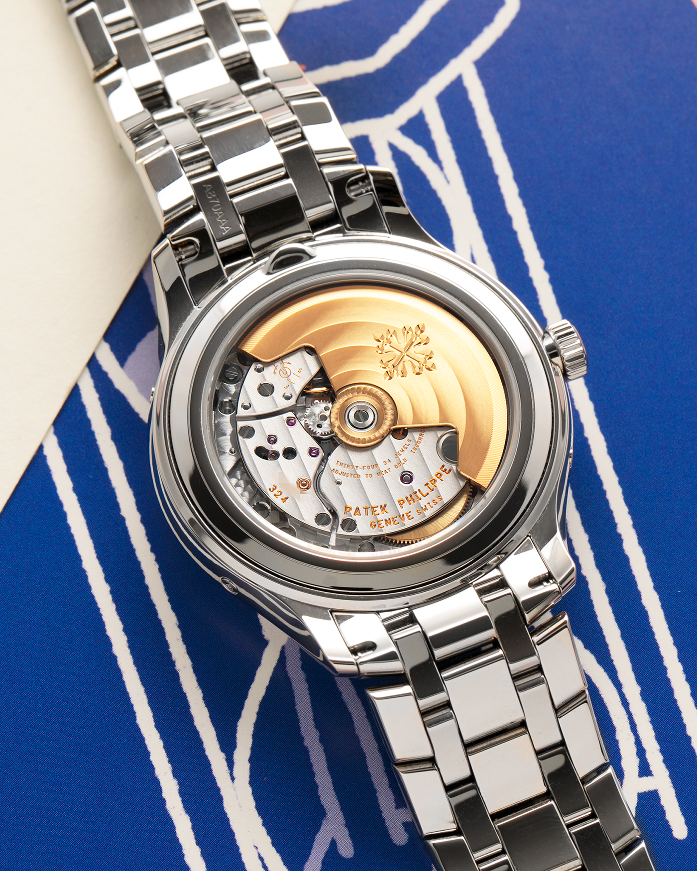 Brand: Patek Philippe
Year: 2023
Model: Annual Calendar Moonphase
Reference: 4947/1A-001
Material: Stainless Steel
Movement: Patek Philippe Self-Winding Cal. 26-330 S QA LU
Case Dimensions: 38mm Diameter 11mm Thickness
Lug Width: 19mm
Bracelet: Patek Philippe Stainless Steel Bracelet with Signed Clasp