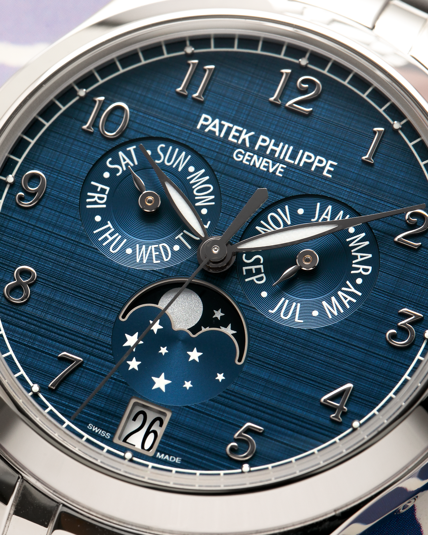 Brand: Patek Philippe
Year: 2023
Model: Annual Calendar Moonphase
Reference: 4947/1A-001
Material: Stainless Steel
Movement: Patek Philippe Self-Winding Cal. 26-330 S QA LU
Case Dimensions: 38mm Diameter 11mm Thickness
Lug Width: 19mm
Bracelet: Patek Philippe Stainless Steel Bracelet with Signed Clasp