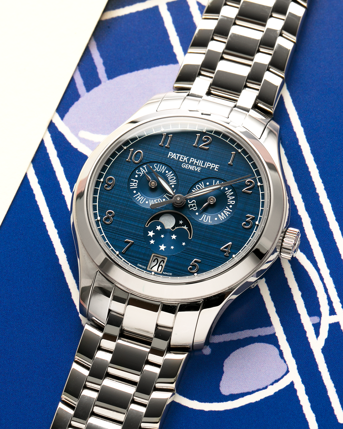 Brand: Patek Philippe
Year: 2023
Model: Annual Calendar Moonphase
Reference: 4947/1A-001
Material: Stainless Steel
Movement: Patek Philippe Self-Winding Cal. 26-330 S QA LU
Case Dimensions: 38mm Diameter 11mm Thickness
Lug Width: 19mm
Bracelet: Patek Philippe Stainless Steel Bracelet with Signed Clasp