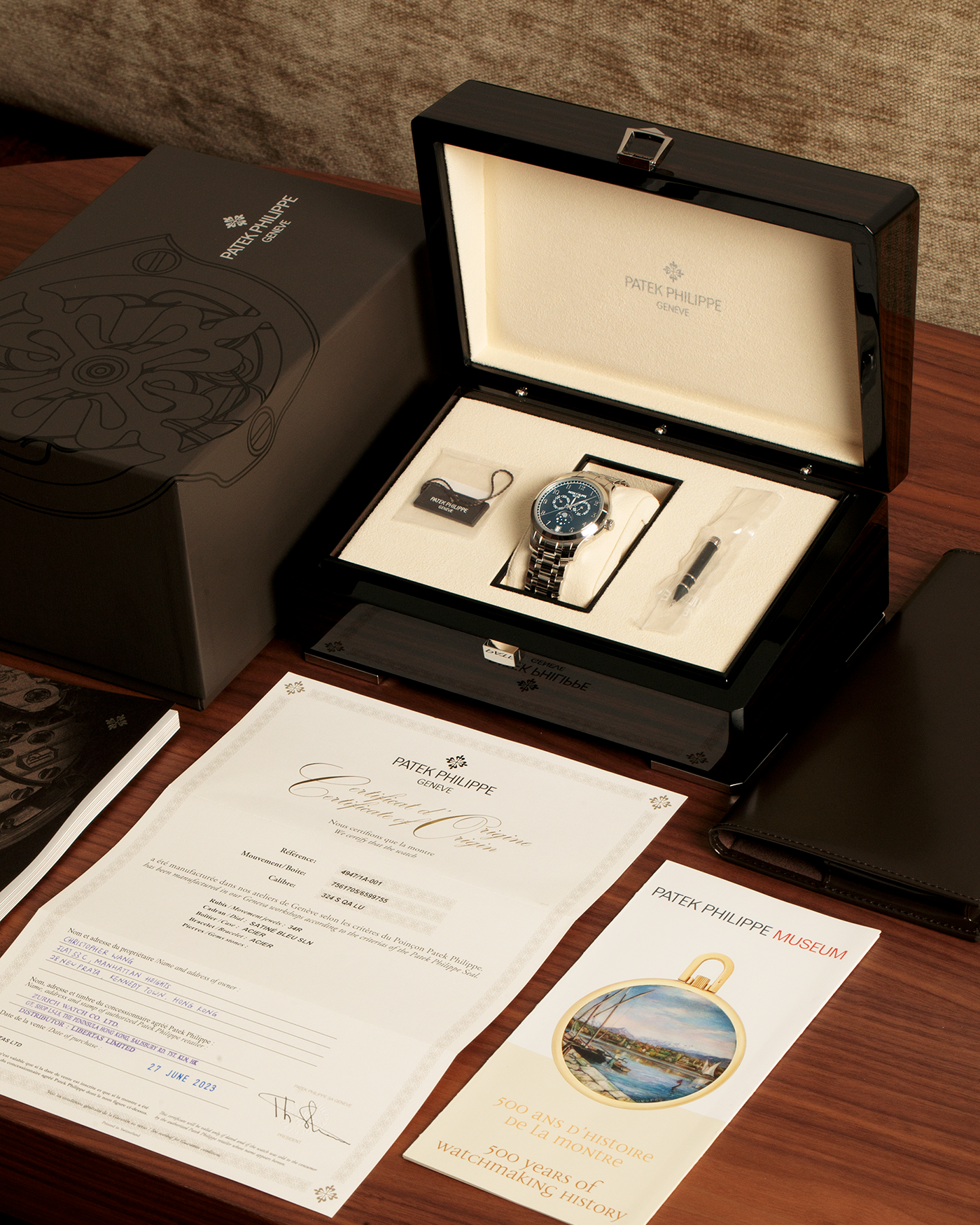 Brand: Patek Philippe
Year: 2023
Model: Annual Calendar Moonphase
Reference: 4947/1A-001
Material: Stainless Steel
Movement: Patek Philippe Self-Winding Cal. 26-330 S QA LU
Case Dimensions: 38mm Diameter 11mm Thickness
Lug Width: 19mm
Bracelet: Patek Philippe Stainless Steel Bracelet with Signed Clasp