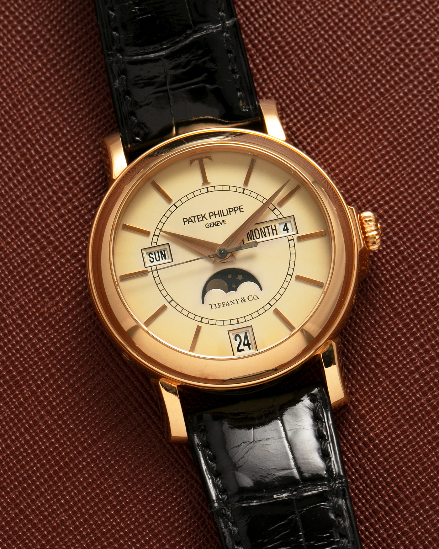 Brand: Patek Philippe
Year: 2001
Model: Annual Calendar
Reference Number: 5150R / ‘T150’
Material: 18-carat Rose Gold
Movement: Patek Philippe Cal. 315 S QA LU, Self-Winding
Case Dimensions: 36mm x 12.6mm (Lug-to-Lug 44mm)
Lug Width: 19mm
Strap: Patek Philippe Black Alligator Leather Strap with Signed 18-carat Rose Gold Tang Buckle