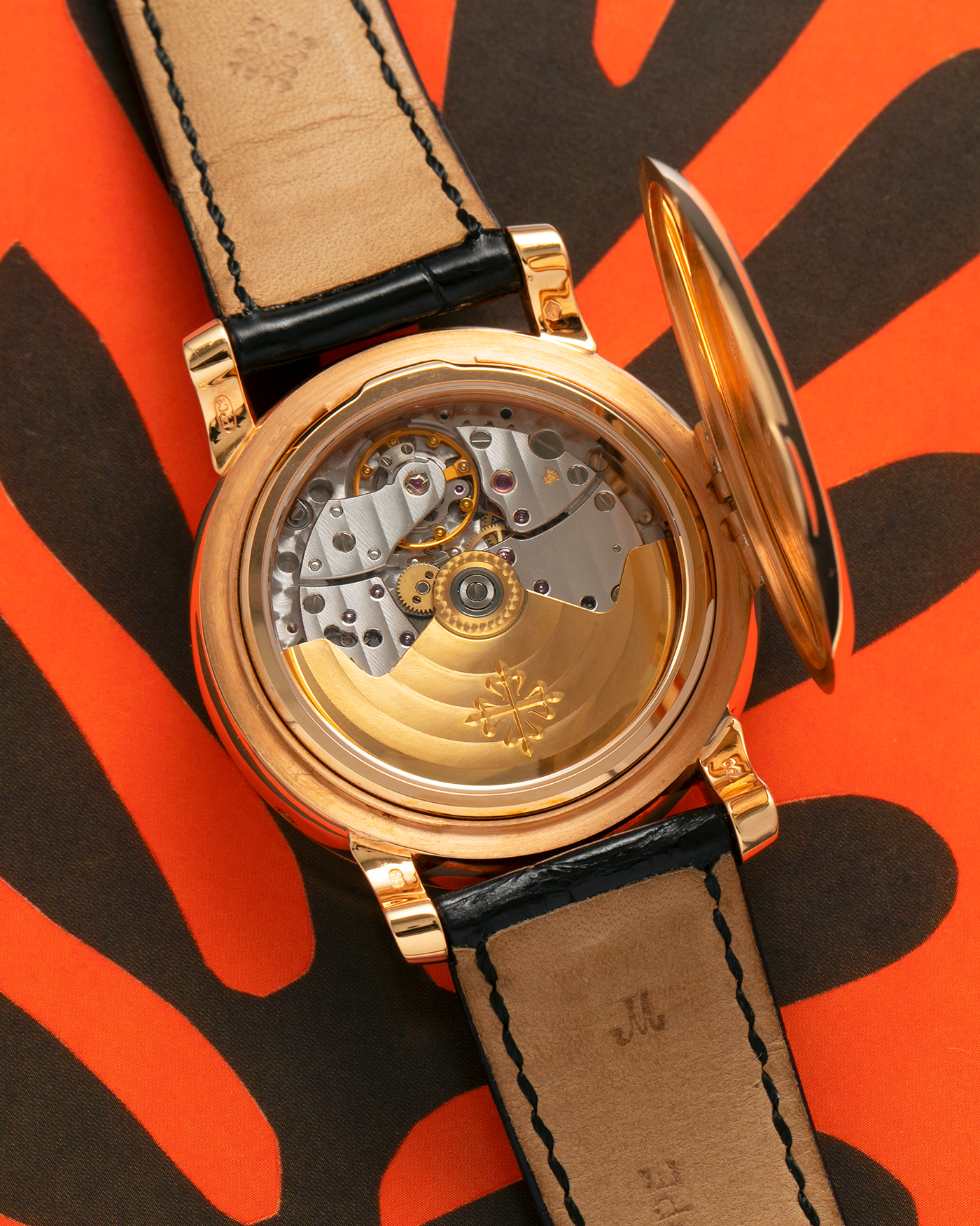 Brand: Patek Philippe
Year: 2001
Model: Annual Calendar
Reference Number: 5150R / ‘T150’
Material: 18-carat Rose Gold
Movement: Patek Philippe Cal. 315 S QA LU, Self-Winding
Case Dimensions: 36mm x 12.6mm (Lug-to-Lug 44mm)
Lug Width: 19mm
Strap: Patek Philippe Black Alligator Leather Strap with Signed 18-carat Rose Gold Tang Buckle