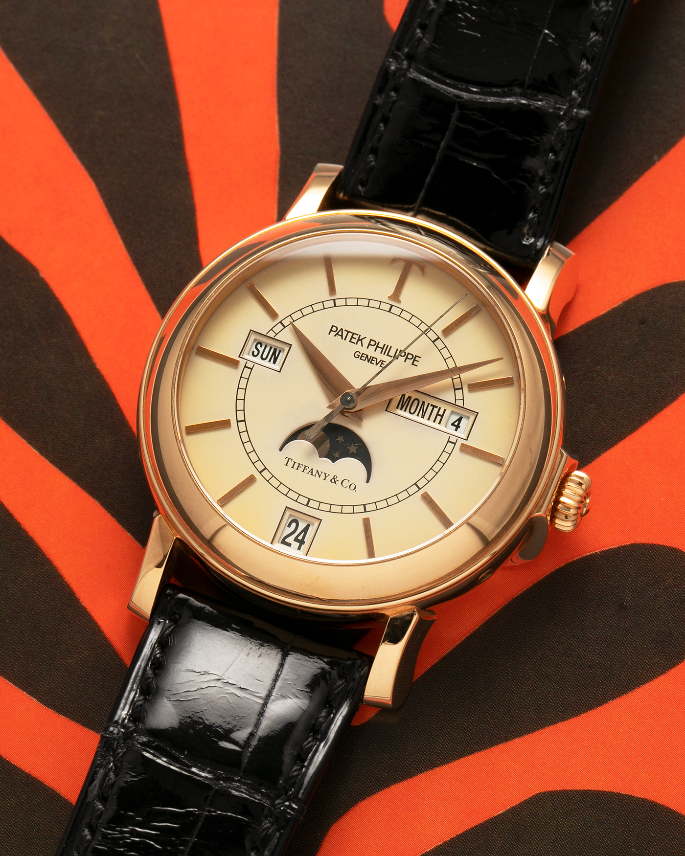 Brand: Patek Philippe
Year: 2001
Model: Annual Calendar
Reference Number: 5150R / ‘T150’
Material: 18-carat Rose Gold
Movement: Patek Philippe Cal. 315 S QA LU, Self-Winding
Case Dimensions: 36mm x 12.6mm (Lug-to-Lug 44mm)
Lug Width: 19mm
Strap: Patek Philippe Black Alligator Leather Strap with Signed 18-carat Rose Gold Tang Buckle