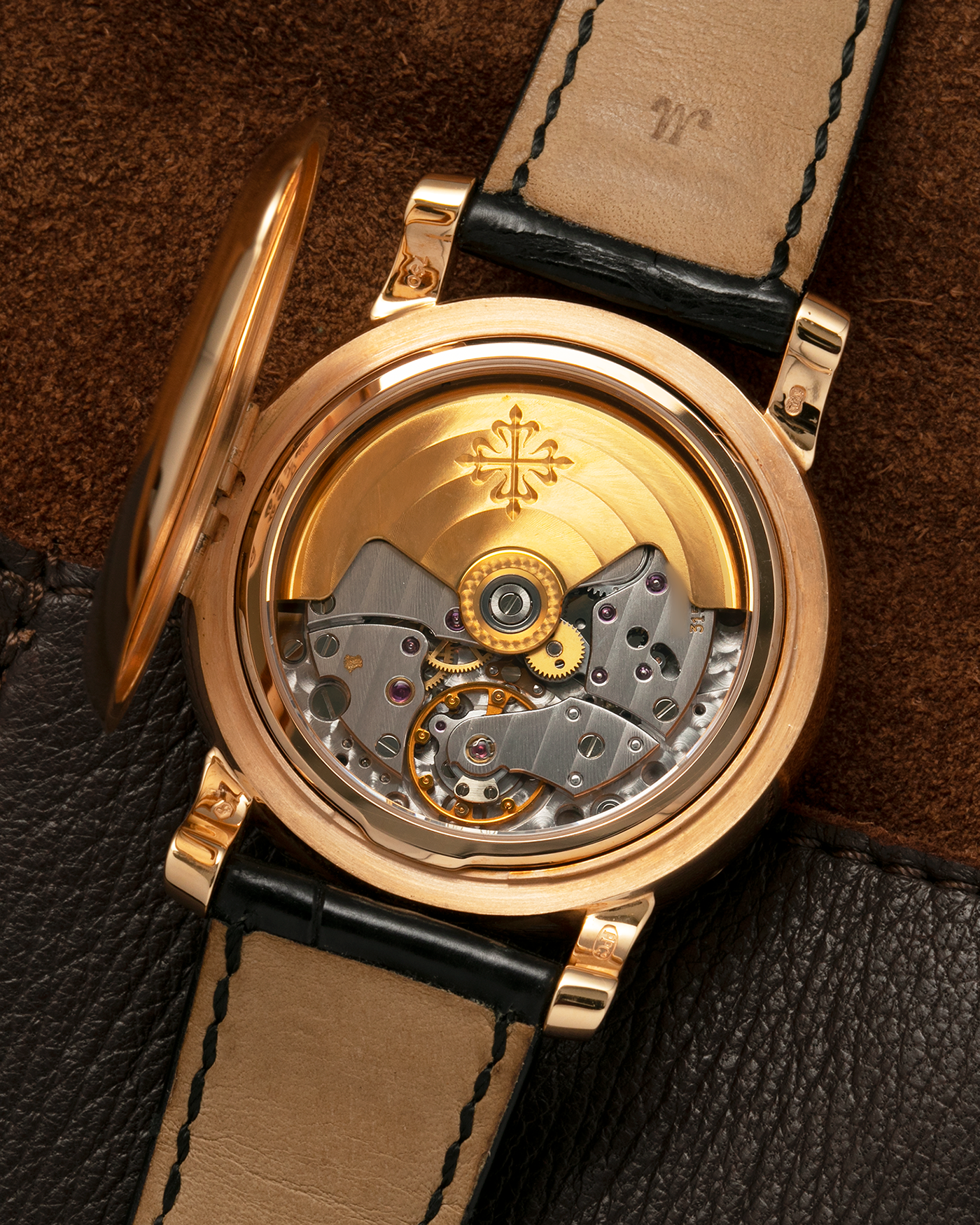 Brand: Patek Philippe
Year: 2001
Model: Annual Calendar
Reference Number: 5150R / ‘T150’
Material: 18-carat Rose Gold
Movement: Patek Philippe Cal. 315 S QA LU, Self-Winding
Case Dimensions: 36mm x 12.6mm (Lug-to-Lug 44mm)
Lug Width: 19mm
Strap: Patek Philippe Black Alligator Leather Strap with Signed 18-carat Rose Gold Tang Buckle