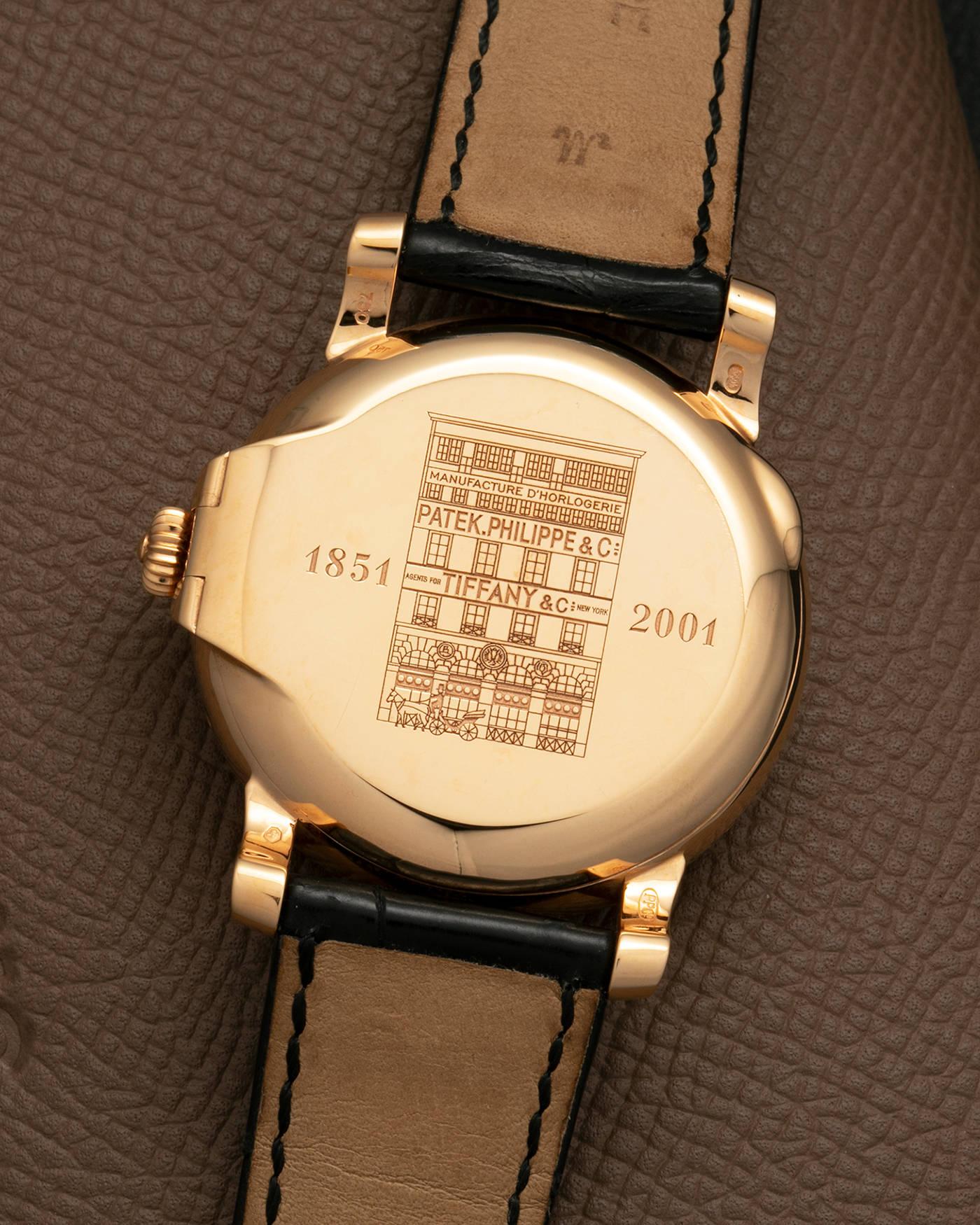 Brand: Patek Philippe
Year: 2001
Model: Annual Calendar
Reference Number: 5150R / ‘T150’
Material: 18-carat Rose Gold
Movement: Patek Philippe Cal. 315 S QA LU, Self-Winding
Case Dimensions: 36mm x 12.6mm (Lug-to-Lug 44mm)
Lug Width: 19mm
Strap: Patek Philippe Black Alligator Leather Strap with Signed 18-carat Rose Gold Tang Buckle