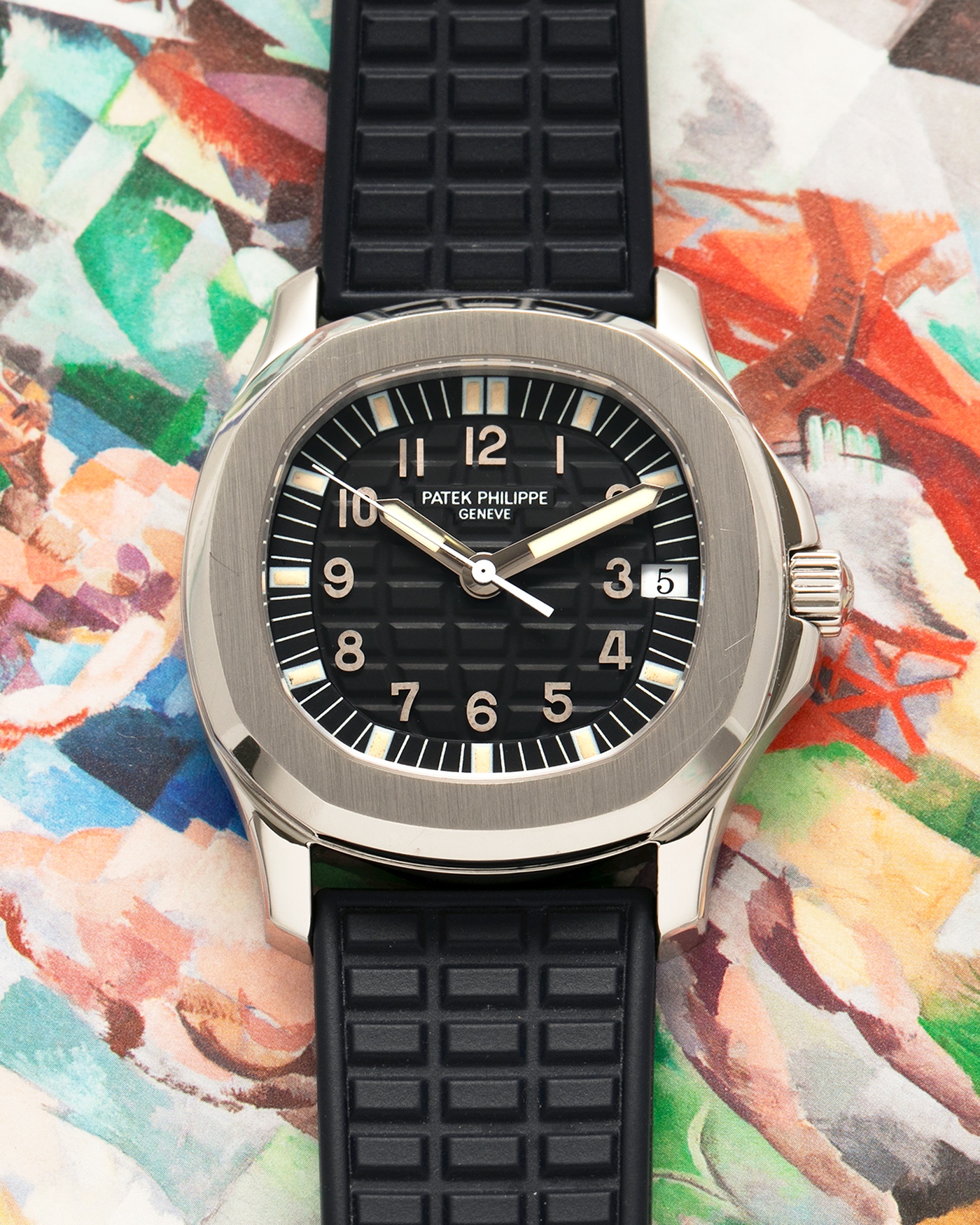 Brand: Patek Philippe
Year: 1997
Model: Aquanaut
Reference: 5060A
Material: Stainless Steel
Movement: Patek Philippe Cal. 330 SC, Self-Winding
Case Dimensions: 36mm x 8.5mm (Lug-to-Lug 46mm)
Lug Width: 19mm
Straps: Patek Philippe Black ‘Tropic’ Rubber Strap for Aquanaut with Signed Stainless Steel Butterfly Double Fold Deployant Clasp, extra uncut Patek Philippe Khaki Green ‘Tropic’ Rubber Strap for Aquanaut