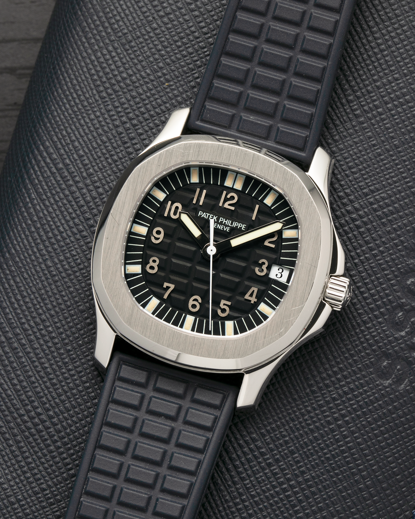 Brand: Patek Philippe
Year: 1997
Model: Aquanaut
Reference: 5060A
Material: Stainless Steel
Movement: Patek Philippe Cal. 330 SC, Self-Winding
Case Dimensions: 36mm x 8.5mm (Lug-to-Lug 46mm)
Lug Width: 19mm
Straps: Patek Philippe Black ‘Tropic’ Rubber Strap for Aquanaut with Signed Stainless Steel Butterfly Double Fold Deployant Clasp, extra uncut Patek Philippe Khaki Green ‘Tropic’ Rubber Strap for Aquanaut