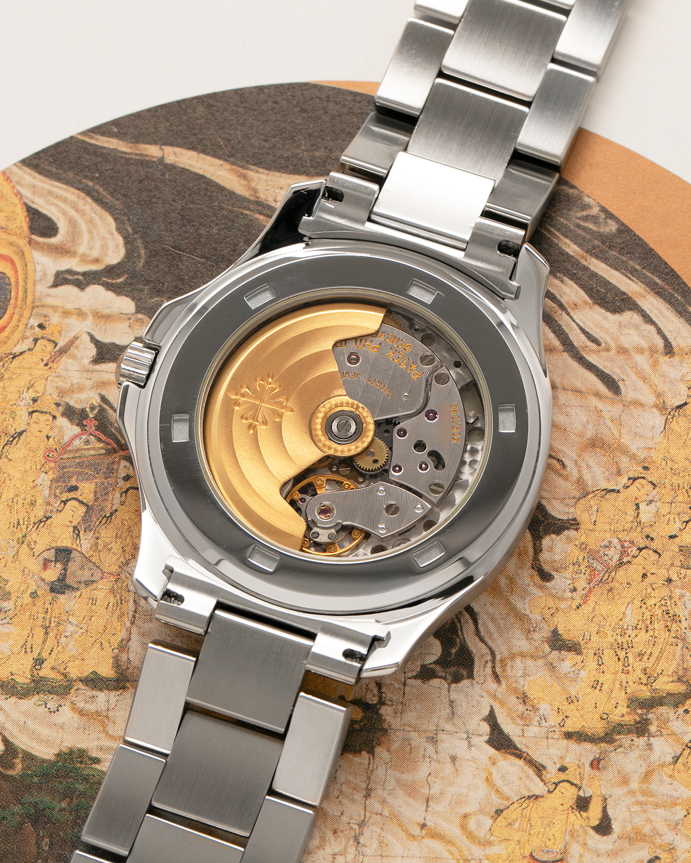 Brand: Patek Philippe
Year: 2000
Model: Aquanaut
Reference Number: 5065A
Material: Stainless Steel
Movement: Patek Philippe Cal. 315 SC. Self-Winding
Case Dimensions: 38mm x 8.2mm (Lug-to-Lug 44mm)
Lug Width: 19mm
Bracelet: Patek Philippe Multi-Link Stainless Steel Bracelet  