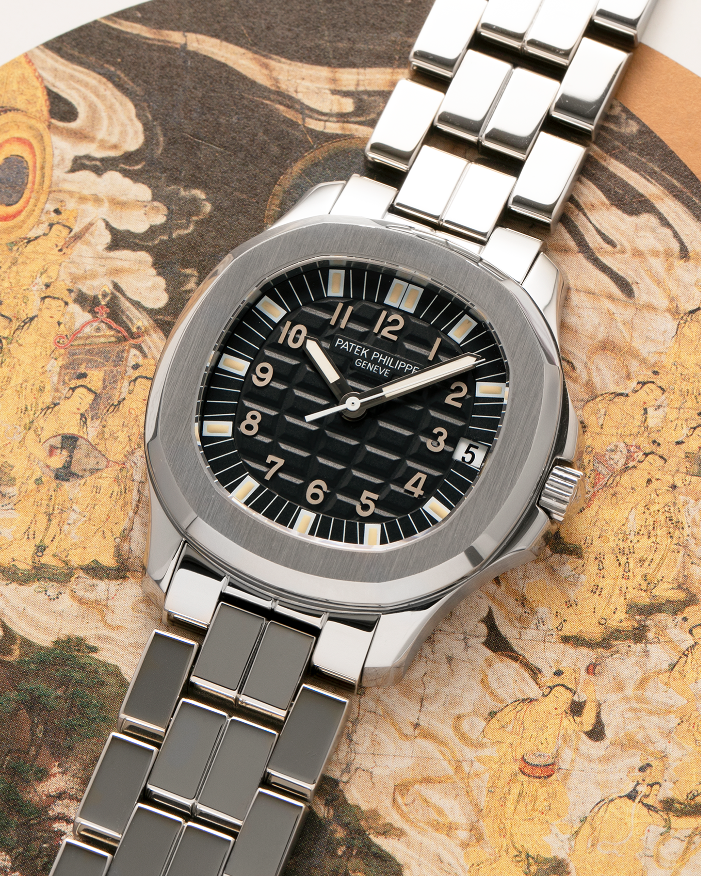 Brand: Patek Philippe
Year: 2000
Model: Aquanaut
Reference Number: 5065A
Material: Stainless Steel
Movement: Patek Philippe Cal. 315 SC. Self-Winding
Case Dimensions: 38mm x 8.2mm (Lug-to-Lug 44mm)
Lug Width: 19mm
Bracelet: Patek Philippe Multi-Link Stainless Steel Bracelet  