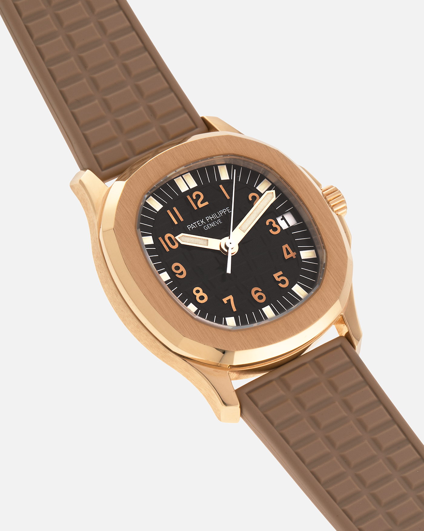 Brand: Patek Philippe
Year: 2004
Model: Aquanaut
Reference: 5066J
Material: 18k Yellow Gold
Movement: Patek Philippe Cal. 330 SC, Self-Winding
Case Dimensions: 36mm x 8.5mm
Lug Width: 19mm
Straps: Patek Philippe Beige ‘Tropic’ Rubber Strap with Signed 18k Yellow Gold Butterfly Double Fold Deployant Clasp. Extra Patek Philippe Khaki Green Rubber Strap.