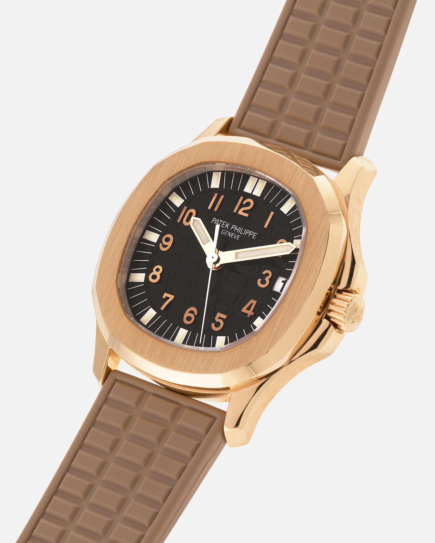 Brand: Patek Philippe
Year: 2004
Model: Aquanaut
Reference: 5066J
Material: 18k Yellow Gold
Movement: Patek Philippe Cal. 330 SC, Self-Winding
Case Dimensions: 36mm x 8.5mm
Lug Width: 19mm
Straps: Patek Philippe Beige ‘Tropic’ Rubber Strap with Signed 18k Yellow Gold Butterfly Double Fold Deployant Clasp. Extra Patek Philippe Khaki Green Rubber Strap.