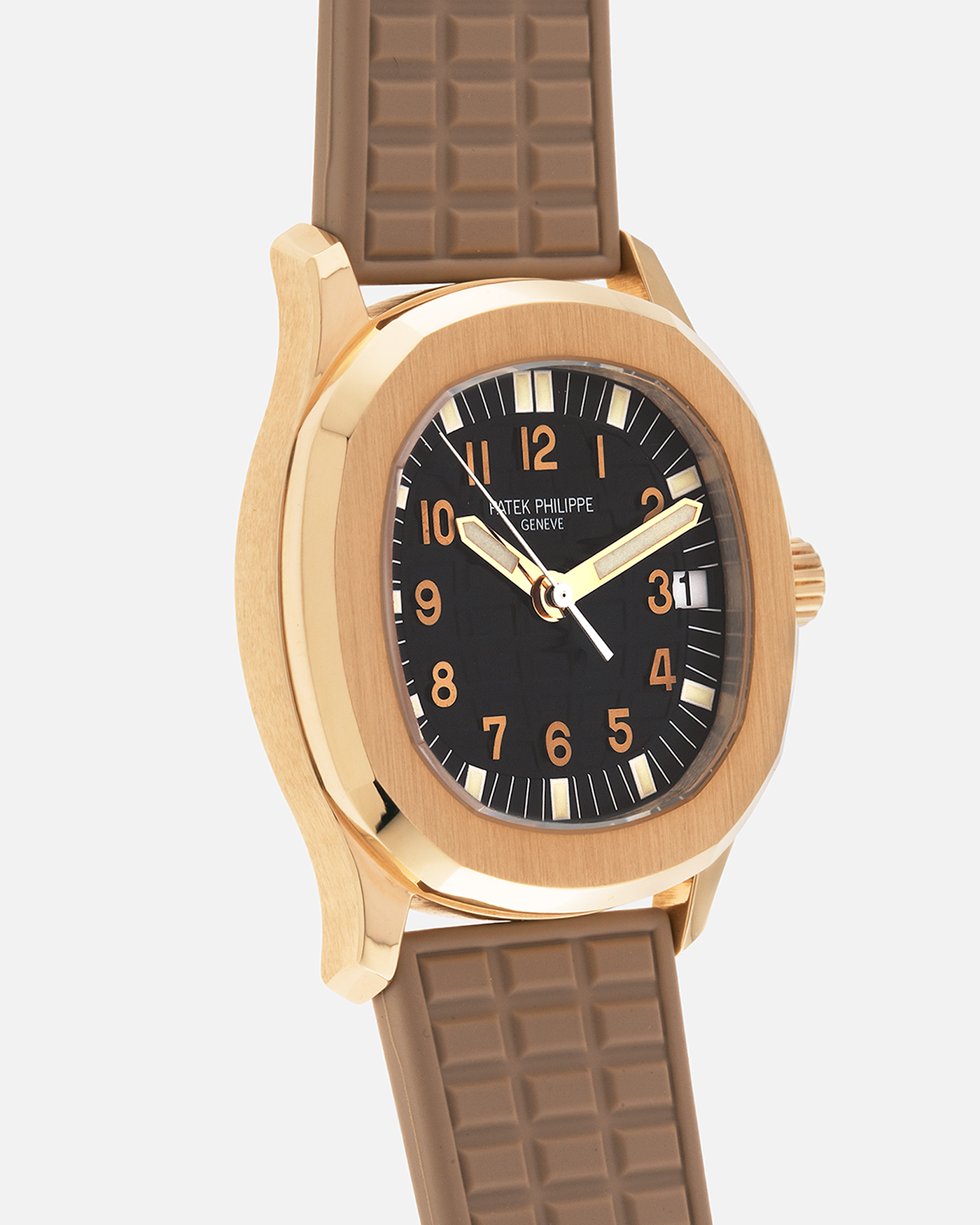 Brand: Patek Philippe
Year: 2004
Model: Aquanaut
Reference: 5066J
Material: 18k Yellow Gold
Movement: Patek Philippe Cal. 330 SC, Self-Winding
Case Dimensions: 36mm x 8.5mm
Lug Width: 19mm
Straps: Patek Philippe Beige ‘Tropic’ Rubber Strap with Signed 18k Yellow Gold Butterfly Double Fold Deployant Clasp. Extra Patek Philippe Khaki Green Rubber Strap.