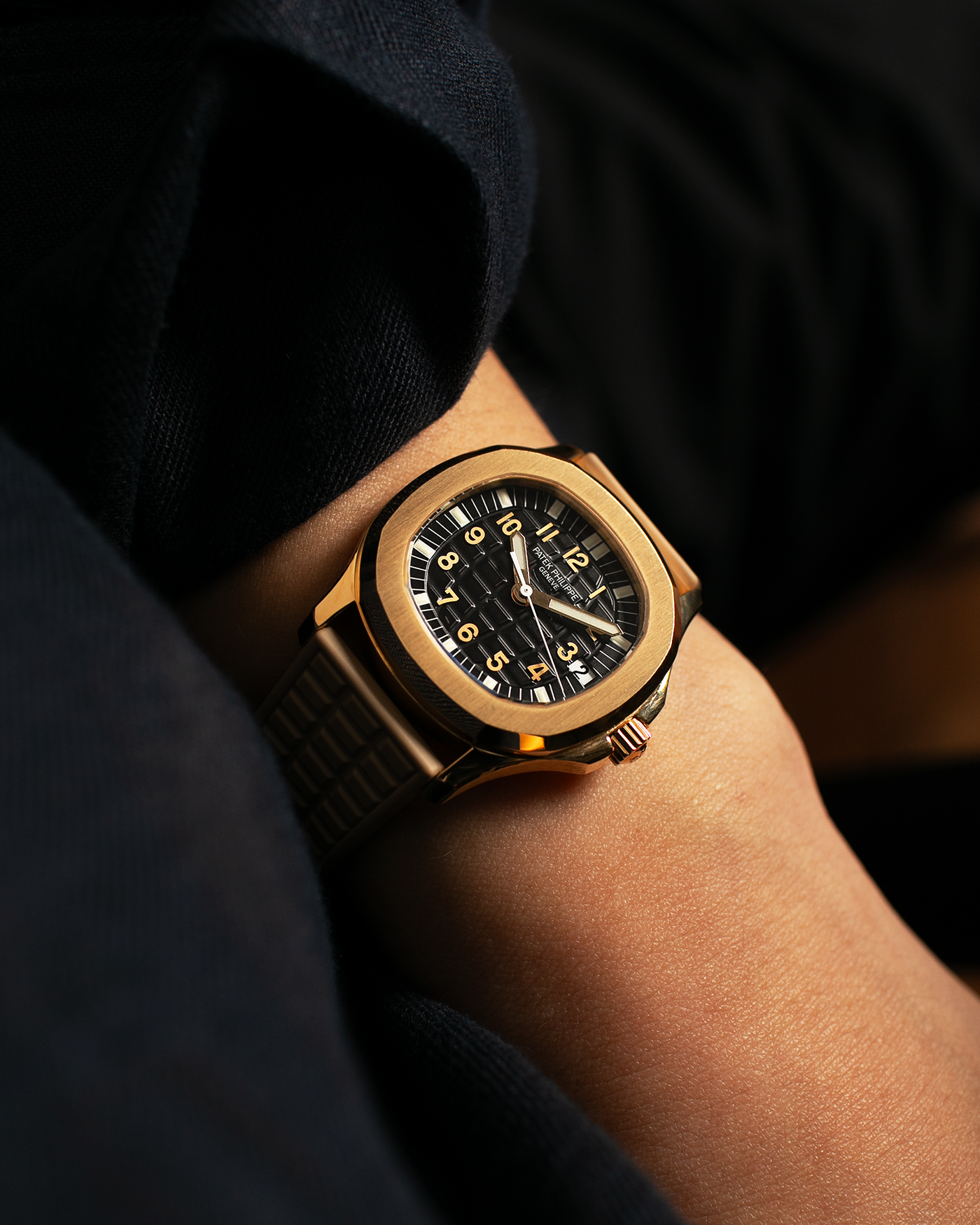 Brand: Patek Philippe
Year: 2004
Model: Aquanaut
Reference: 5066J
Material: 18k Yellow Gold
Movement: Patek Philippe Cal. 330 SC, Self-Winding
Case Dimensions: 36mm x 8.5mm
Lug Width: 19mm
Straps: Patek Philippe Beige ‘Tropic’ Rubber Strap with Signed 18k Yellow Gold Butterfly Double Fold Deployant Clasp. Extra Patek Philippe Khaki Green Rubber Strap.