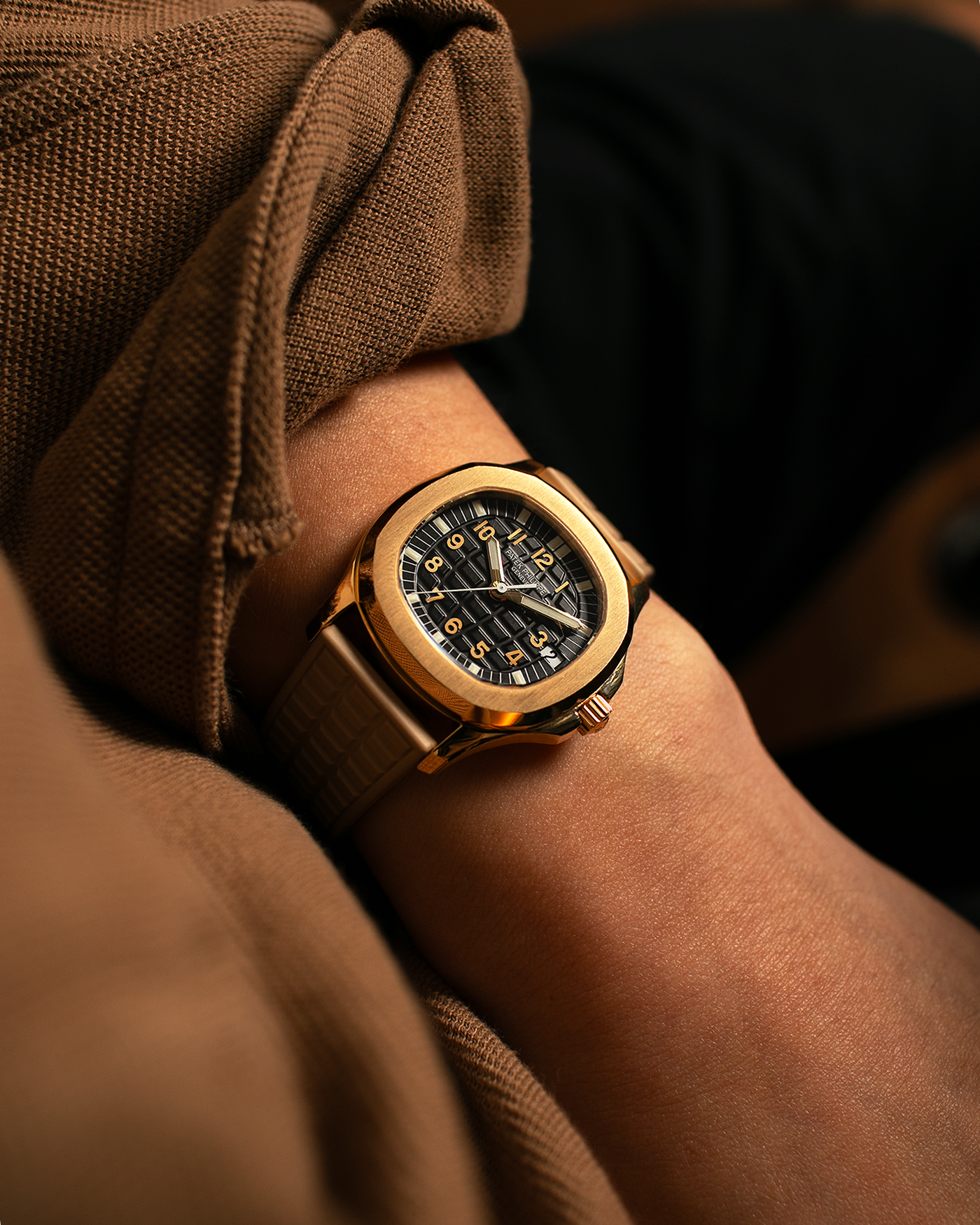 Brand: Patek Philippe
Year: 2004
Model: Aquanaut
Reference: 5066J
Material: 18k Yellow Gold
Movement: Patek Philippe Cal. 330 SC, Self-Winding
Case Dimensions: 36mm x 8.5mm
Lug Width: 19mm
Straps: Patek Philippe Beige ‘Tropic’ Rubber Strap with Signed 18k Yellow Gold Butterfly Double Fold Deployant Clasp. Extra Patek Philippe Khaki Green Rubber Strap.