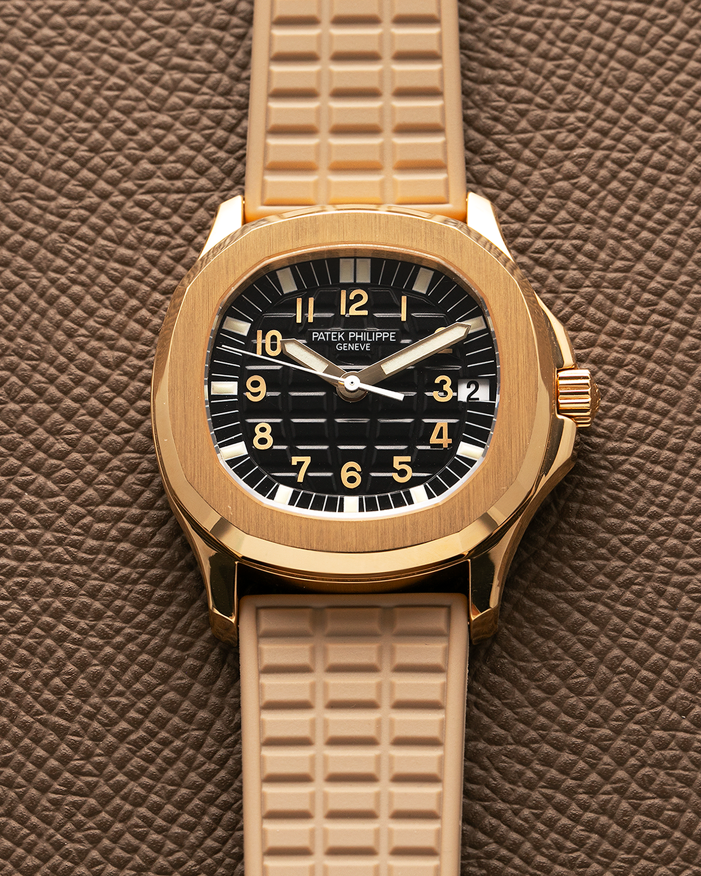 Brand: Patek Philippe
Year: 2004
Model: Aquanaut
Reference: 5066J
Material: 18k Yellow Gold
Movement: Patek Philippe Cal. 330 SC, Self-Winding
Case Dimensions: 36mm x 8.5mm
Lug Width: 19mm
Straps: Patek Philippe Beige ‘Tropic’ Rubber Strap with Signed 18k Yellow Gold Butterfly Double Fold Deployant Clasp. Extra Patek Philippe Khaki Green Rubber Strap.