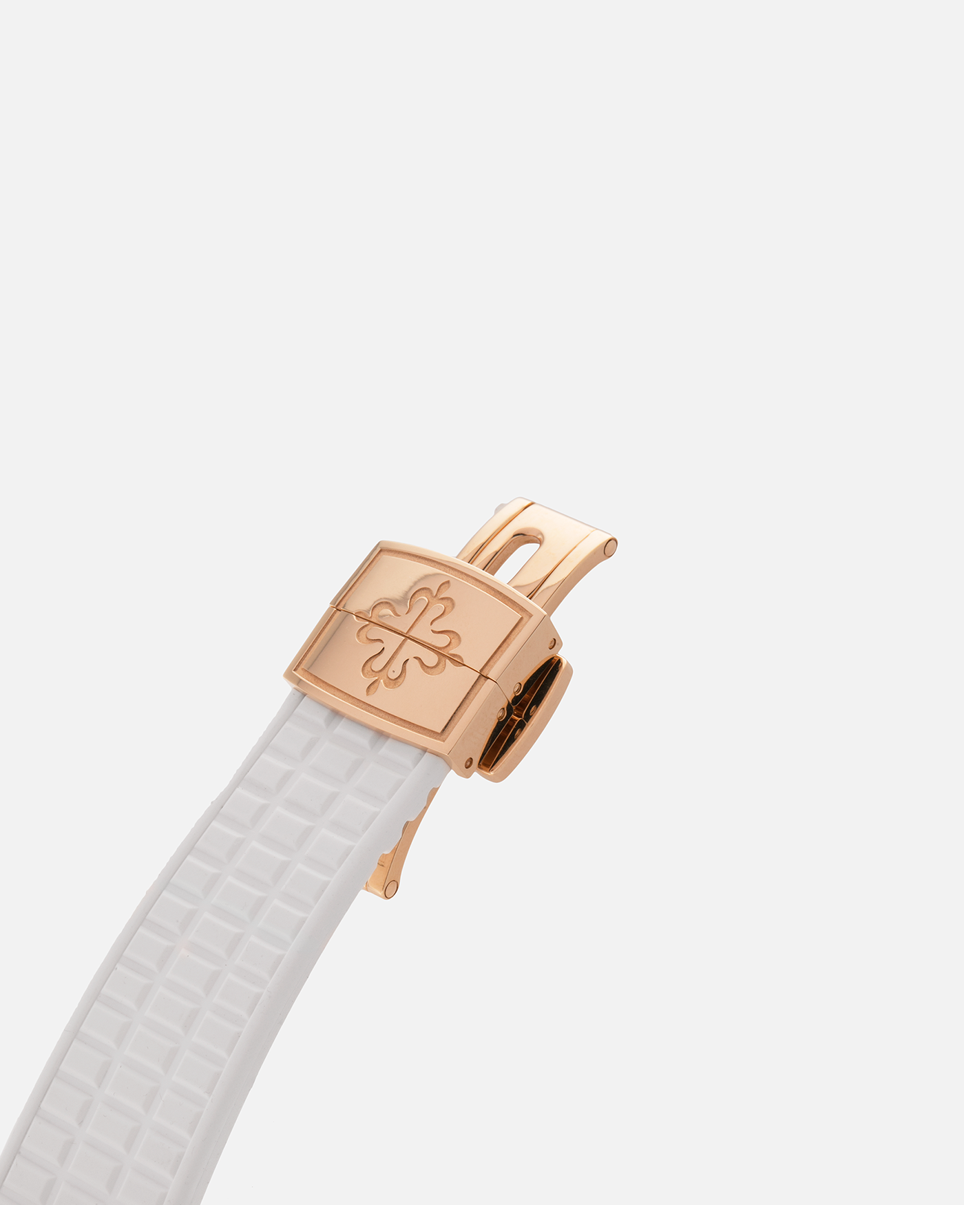 Brand: Patek Philippe
Year: 2015
Model: Aquanaut
Reference Number: 5068R-010
Material: 18k Rose Gold
Movement: Patek Philippe Cal. 324 SC. Self-Winding
Case Dimensions: 35.6mm Diameter 8.5mm Thickness
Strap: Patek Philippe White Rubber Strap and Patek Philippe 18k Rose Gold Deployant Buckle