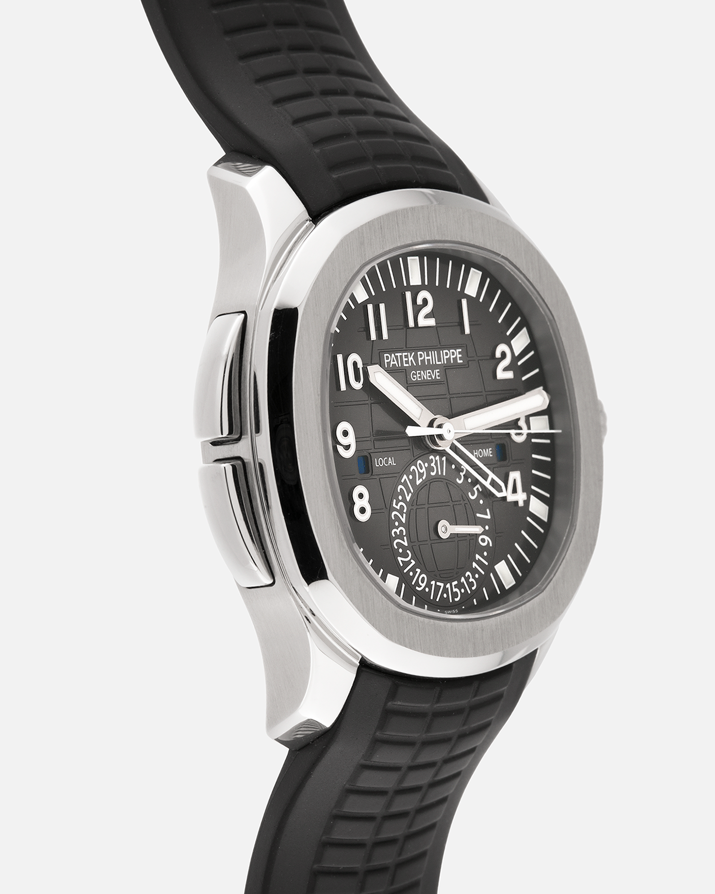 Brand: Patek Philippe
Year: 2015
Model: Aquanaut
Reference Number: 5164A
Material: Stainless Steel
Movement: Calibre 324 C FUS
Case Diameter: 40.8mm
Bracelet: Patek Philippe Aquanaut Black Tropical Rubber Strap with Signed Patek Philippe Stainless Steel Deployant Clasp
