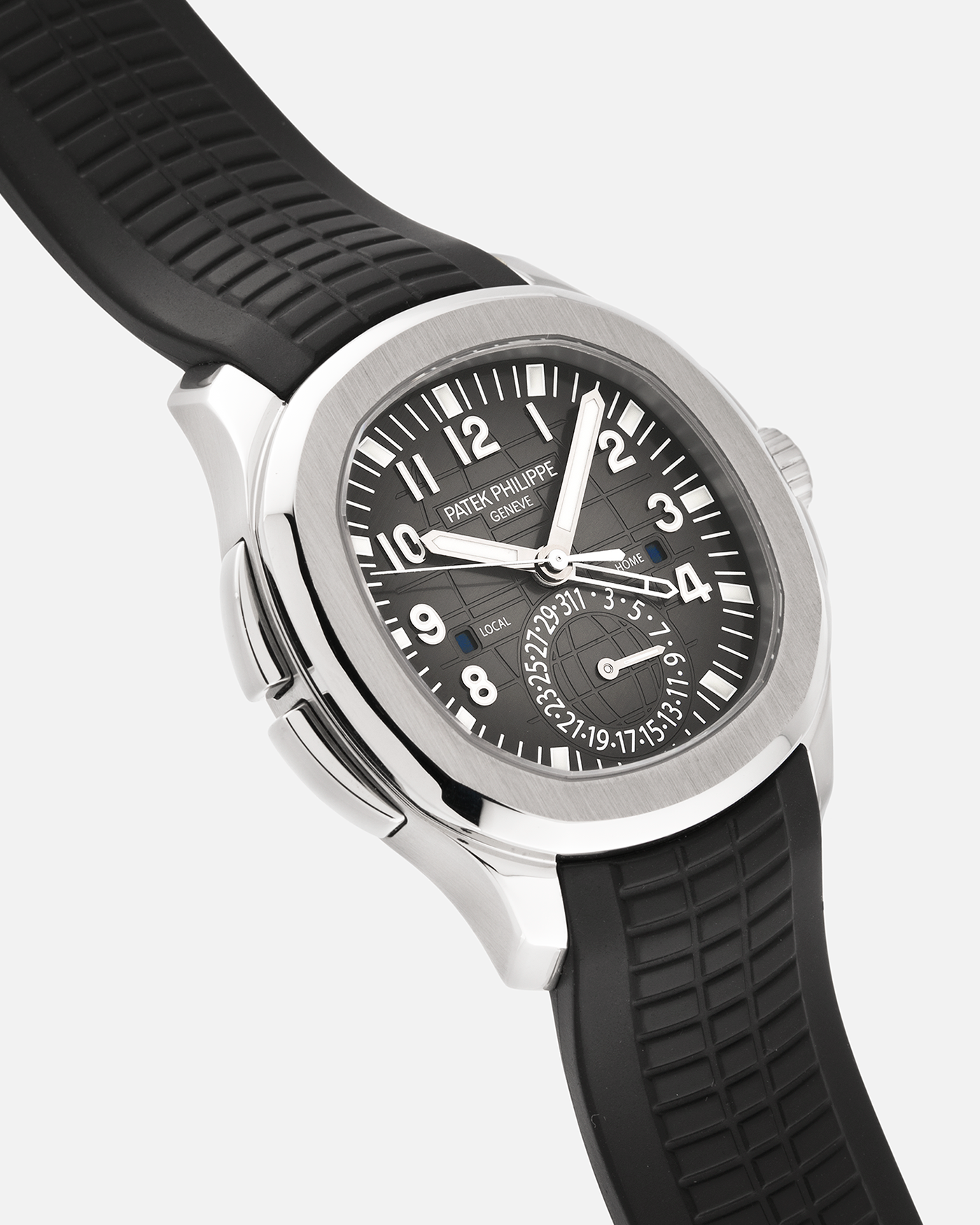 Brand: Patek Philippe
Year: 2015
Model: Aquanaut
Reference Number: 5164A
Material: Stainless Steel
Movement: Calibre 324 C FUS
Case Diameter: 40.8mm
Bracelet: Patek Philippe Aquanaut Black Tropical Rubber Strap with Signed Patek Philippe Stainless Steel Deployant Clasp