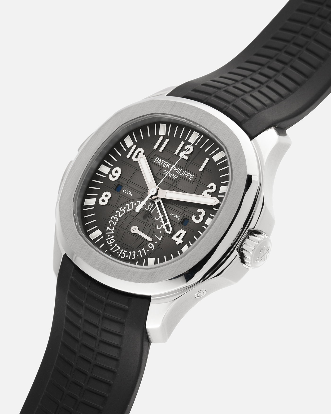 Brand: Patek Philippe
Year: 2015
Model: Aquanaut
Reference Number: 5164A
Material: Stainless Steel
Movement: Calibre 324 C FUS
Case Diameter: 40.8mm
Bracelet: Patek Philippe Aquanaut Black Tropical Rubber Strap with Signed Patek Philippe Stainless Steel Deployant Clasp