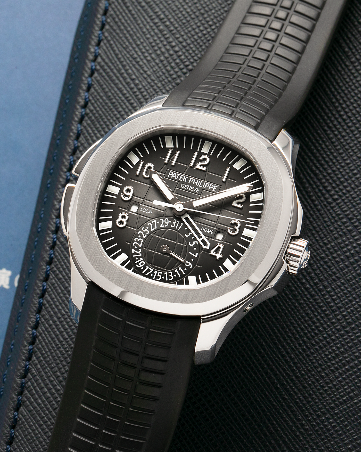 Brand: Patek Philippe
Year: 2015
Model: Aquanaut
Reference Number: 5164A
Material: Stainless Steel
Movement: Calibre 324 C FUS
Case Diameter: 40.8mm
Bracelet: Patek Philippe Aquanaut Black Tropical Rubber Strap with Signed Patek Philippe Stainless Steel Deployant Clasp