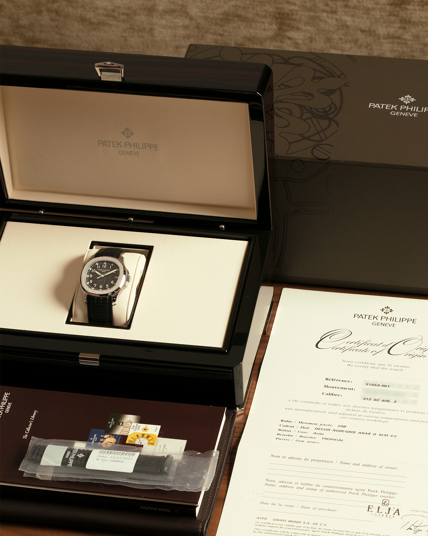 Brand: Patek Philippe
Year: 2000’s
Model: Aquanaut
Reference Number: 5165A
Material: Stainless Steel
Movement: Patek Philippe Cal. 324 S C, Self-Winding
Case Dimensions: 38mm x 8.5mm (Lug-to-Lug 44.5mm)
Straps: Patek Philippe Aquanaut Black Rubber Strap with Signed Deployant Clasp, with an extra Brand New Uncut Patek Philippe Aquanaut Black Rubber Strap