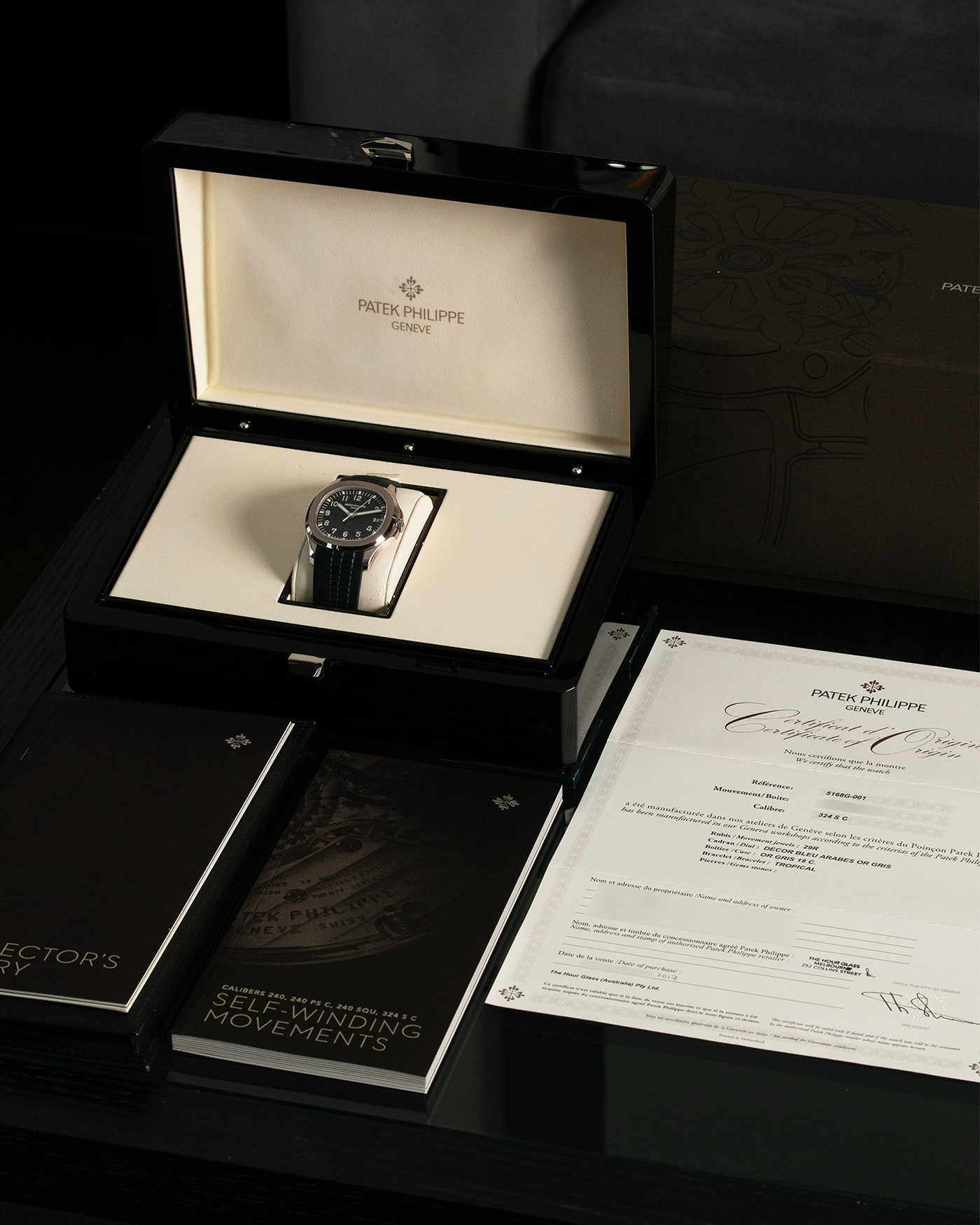 Brand: Patek Philippe Year: 2017 Model: Aquanaut Reference Number: 5168G-001 Material: 18-carat White Gold Movement: Patek Philippe Cal. 324 S C, Self-Winding Case Diameter: 42.2mm x 8.25mm Strap: Patek Philippe Aquanaut Tropical Composite Midnight Blue Strap with Signed 18-carat White Gold Deployant Clasp