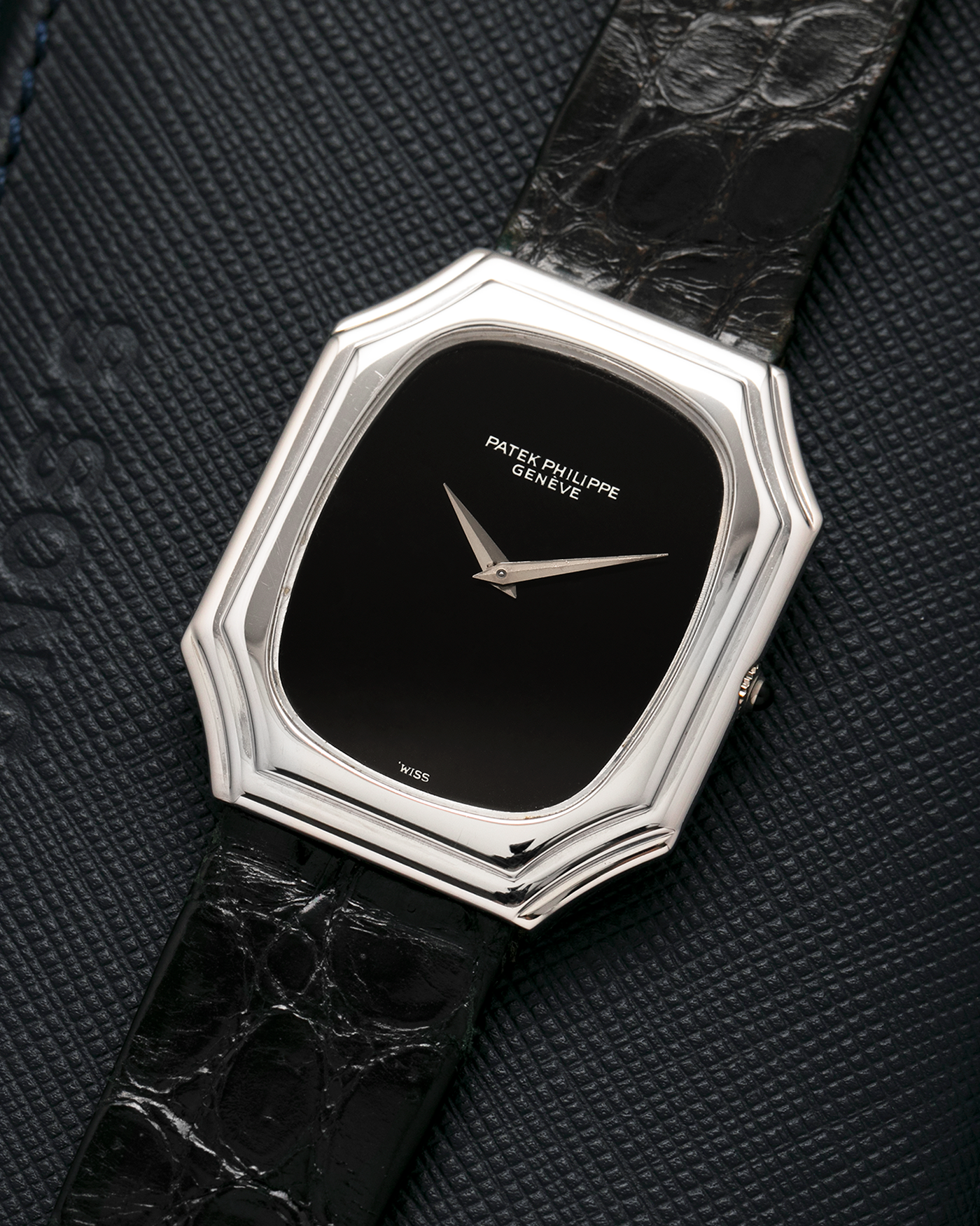 Brand: Patek Philippe
Year: 1976
Reference: 3629 'Bat'
Material: 18-carat White Gold
Movement: Patek Philippe Cal. 177, Manual-Winding
Case Dimensions: 37mm (Including Lugs) x 31mm x 5mm
Lug Width: 17mm
Strap: Patek Philippe Alligator Leather Strap with Signed 18-carat White Gold Tang Buckle