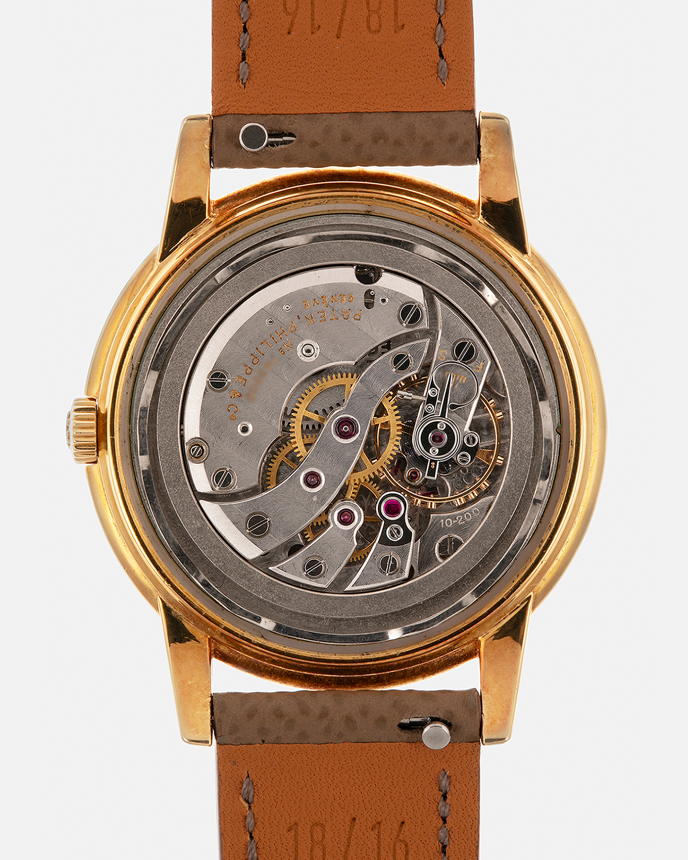 Brand: Patek Philippe
Year: 1957
Model: Calatrava, ‘Huber’ Signed
Reference: 2525
Material: 18-carat Yellow Gold
Movement: Patek Philippe Cal. 10-200, Manual-Winding
Case Dimensions: 36mm x 8.5mm (Lug-to-Lug 42.5mm)
Lug Width: 18mm
Strap: Nostime Taupe Brown Textured Calf Leather Strap