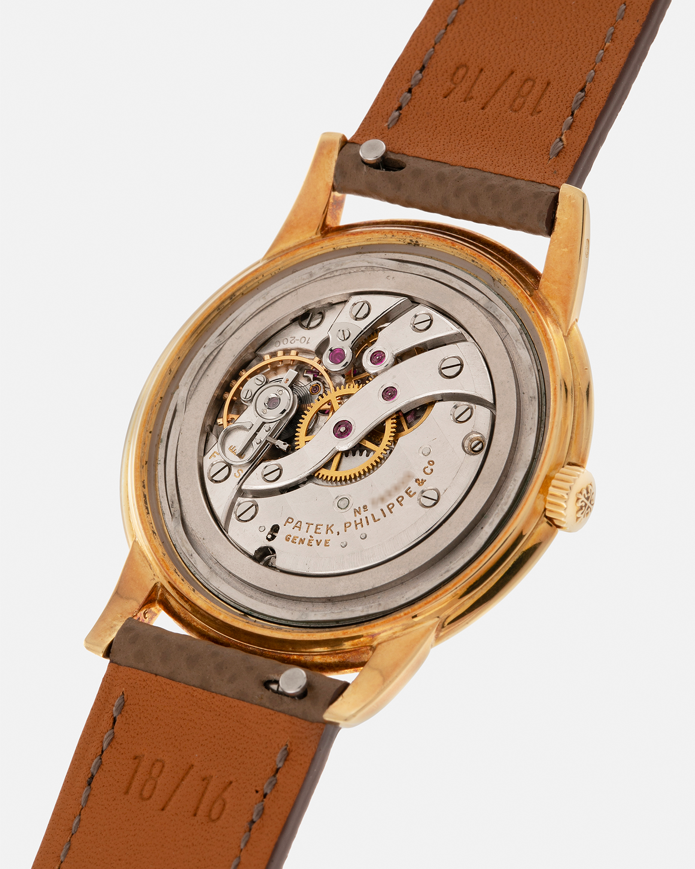 Brand: Patek Philippe
Year: 1957
Model: Calatrava, ‘Huber’ Signed
Reference: 2525
Material: 18-carat Yellow Gold
Movement: Patek Philippe Cal. 10-200, Manual-Winding
Case Dimensions: 36mm x 8.5mm (Lug-to-Lug 42.5mm)
Lug Width: 18mm
Strap: Nostime Taupe Brown Textured Calf Leather Strap