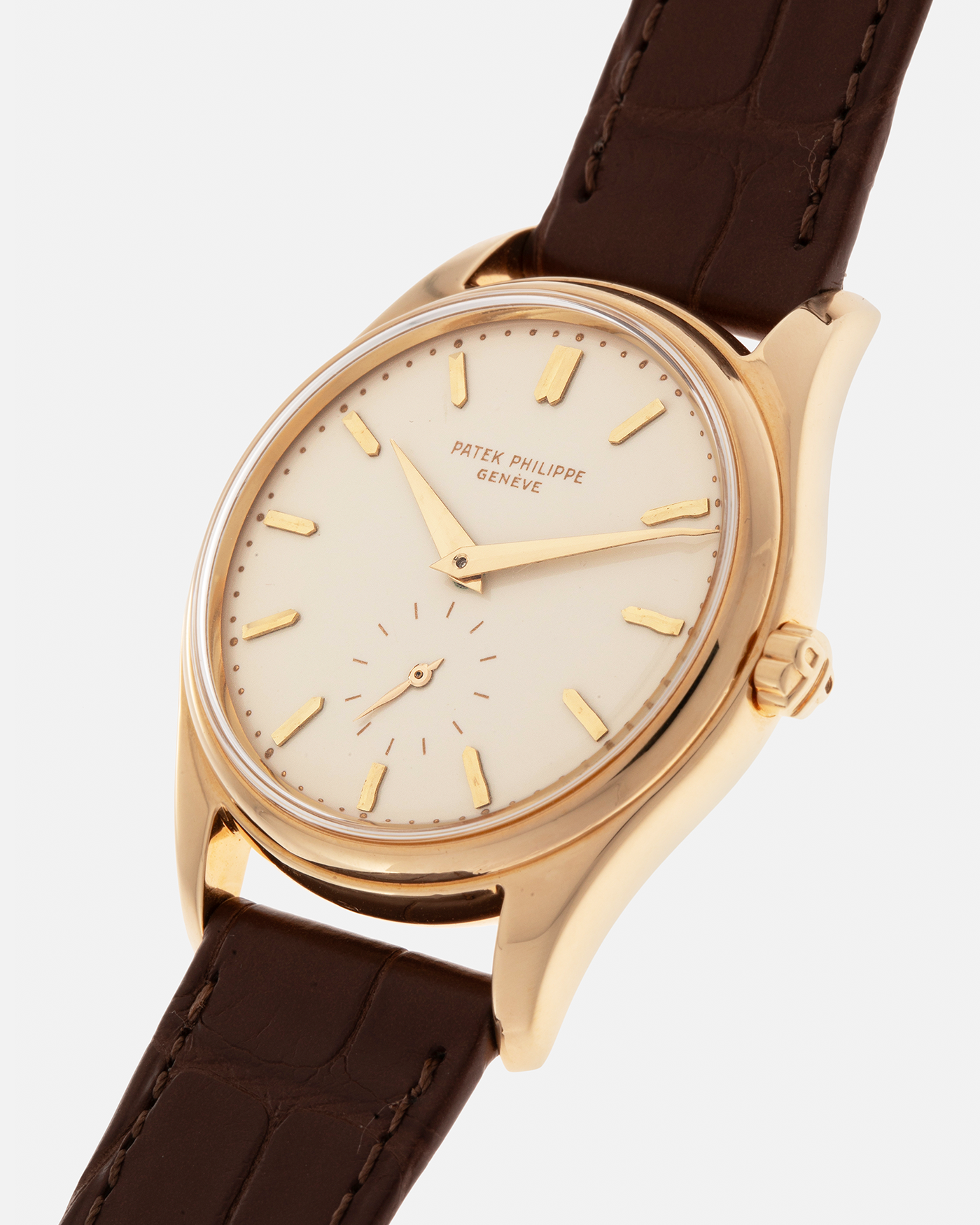 Brand: Patek Philippe
Year: 1957
Model: Calatrava
Reference: 2526, Third Series
Material: 18-carat Yellow Gold
Movement: Patek Philippe Cal. 12-600AT, Self-Winding
Case Dimensions: 36mm x 11.3mm (Lug-to-Lug 44mm)
Lug Width: 18mm
Strap: Patek Philippe Brown Calf Leather Strap with Signed 18-carat Yellow Gold Tang Buckle
